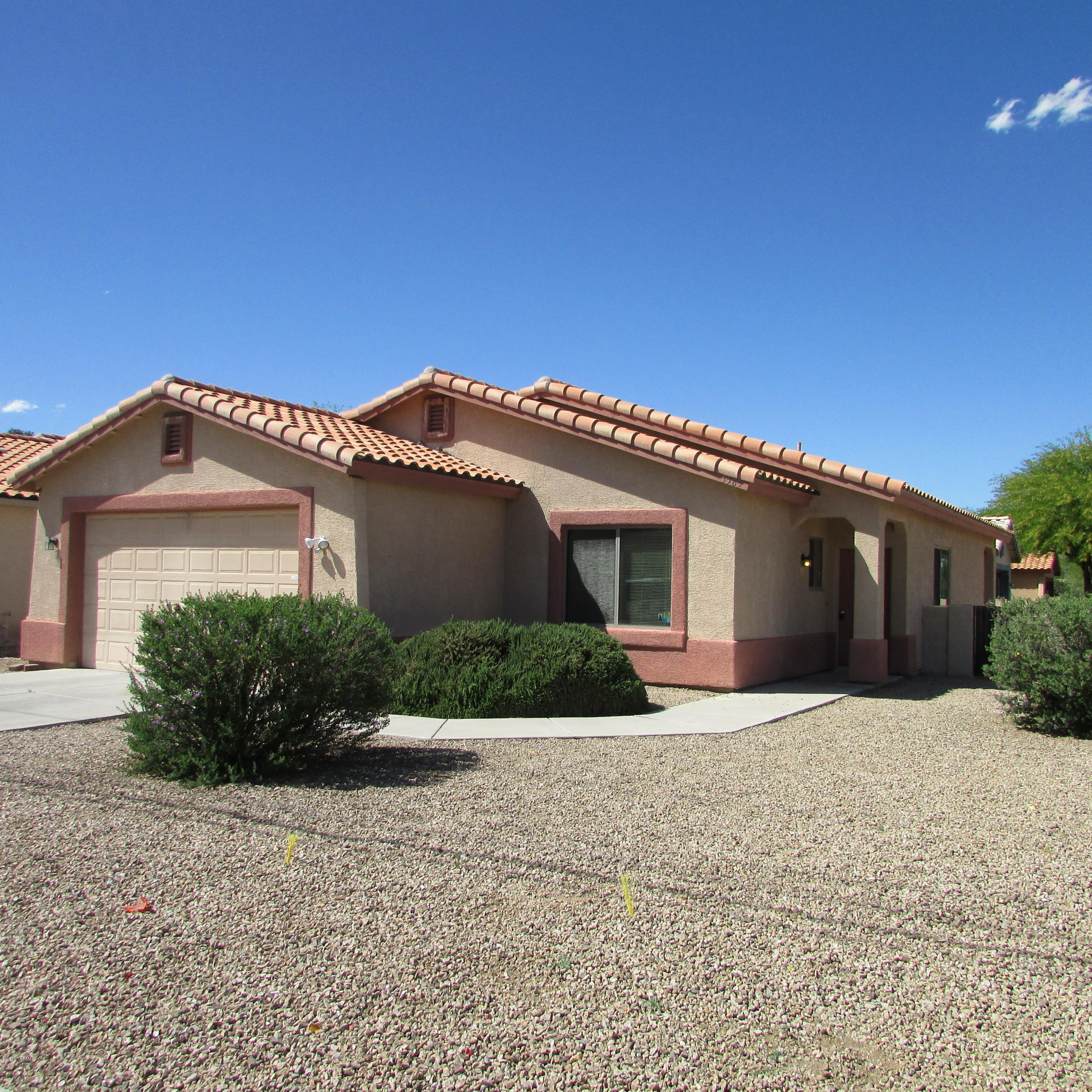 Newer home with open floor plan. Great room, vaulted ceilings, scored/polished concrete floors, dbl garage, stove, fridge, dishwasher, disposal, w/d hkps.