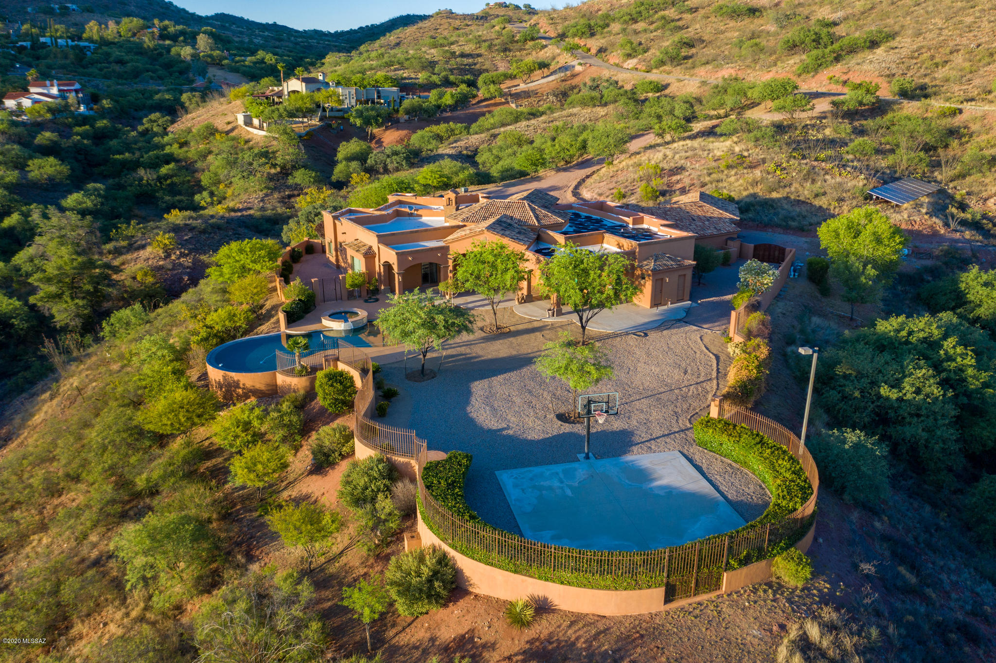 Stunning custom house designed and built by the architect Jose Luis Cuevas. This property offers unlimited custom details. Viking appliances, custom made tiles in kitchen, granite counter tops, custom made by Bertch cabinets, large island with sink, Frankee SS cabinets sinks on kitchen. Maple wood floors by Urbanfloor, walk-in-closets cabinets by California closets, custom made wood blinds, Anderson windows, custom made by Bertch bathroom cabinets, his and hers slow close toilets, custom tile all over through out walls and shower, thick glass shower doors. Marble tiles throughout house from Puebla Mexico. Cantera custom made chimney. Custom wood cabinets on family room. Salt water negative edge pool with solar heater. Owned solar panels, water softener, central vacuum system and much more