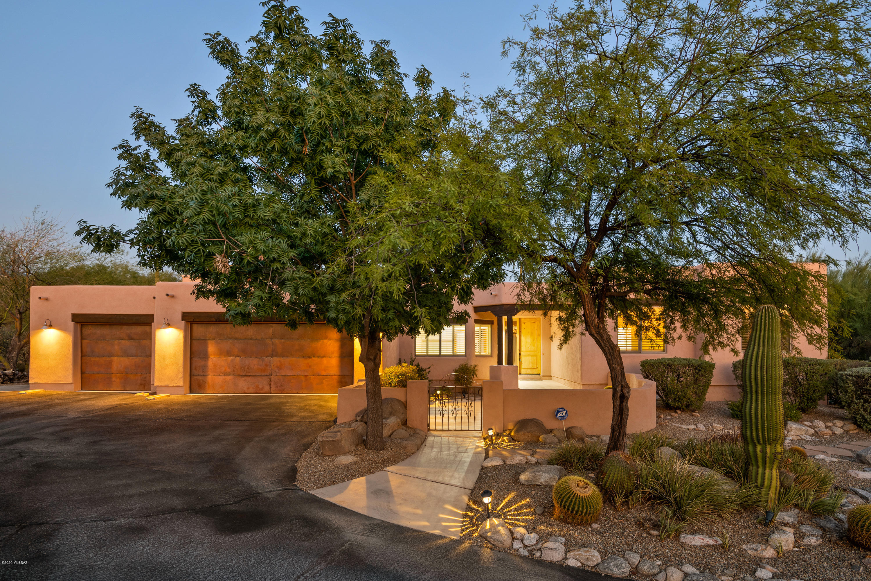 Mountain Views!!  At the end of a private cul-de-sac in the heart of the Catalina Foothills sits a beautifully landscaped home on a private 1.6 acre lot.  4 bedrooms (4th room can be used as an Office or Den) and 2.5 bathrooms makes this home the perfect size at 3,075 sqft.  Freshly painted inside and out, this home has high ceilings and open spaces that meld together.  The kitchen is a chef's delight with a Viking range, granite slab countertops and matching stainless appliances.  Enjoy multiple outdoor patios for incredibly easy indoor/outdoor resort style living.  Lounge by the pool and enjoy the sound of the waterfall while basking in the glory of the majestic Catalina Mountains as a backdrop. The back yard is very private with a hill studded with saguaro cacti that light up brilliantly in the evening.  Close to EVERYTHING!! 10 minutes to UA, 15 minutes to downtown.  An entrance to the "Loop" is only a few minutes walk where you can find almost endless bike, running, jogging trails.  This Spectacular Foothills Gem is a must see!