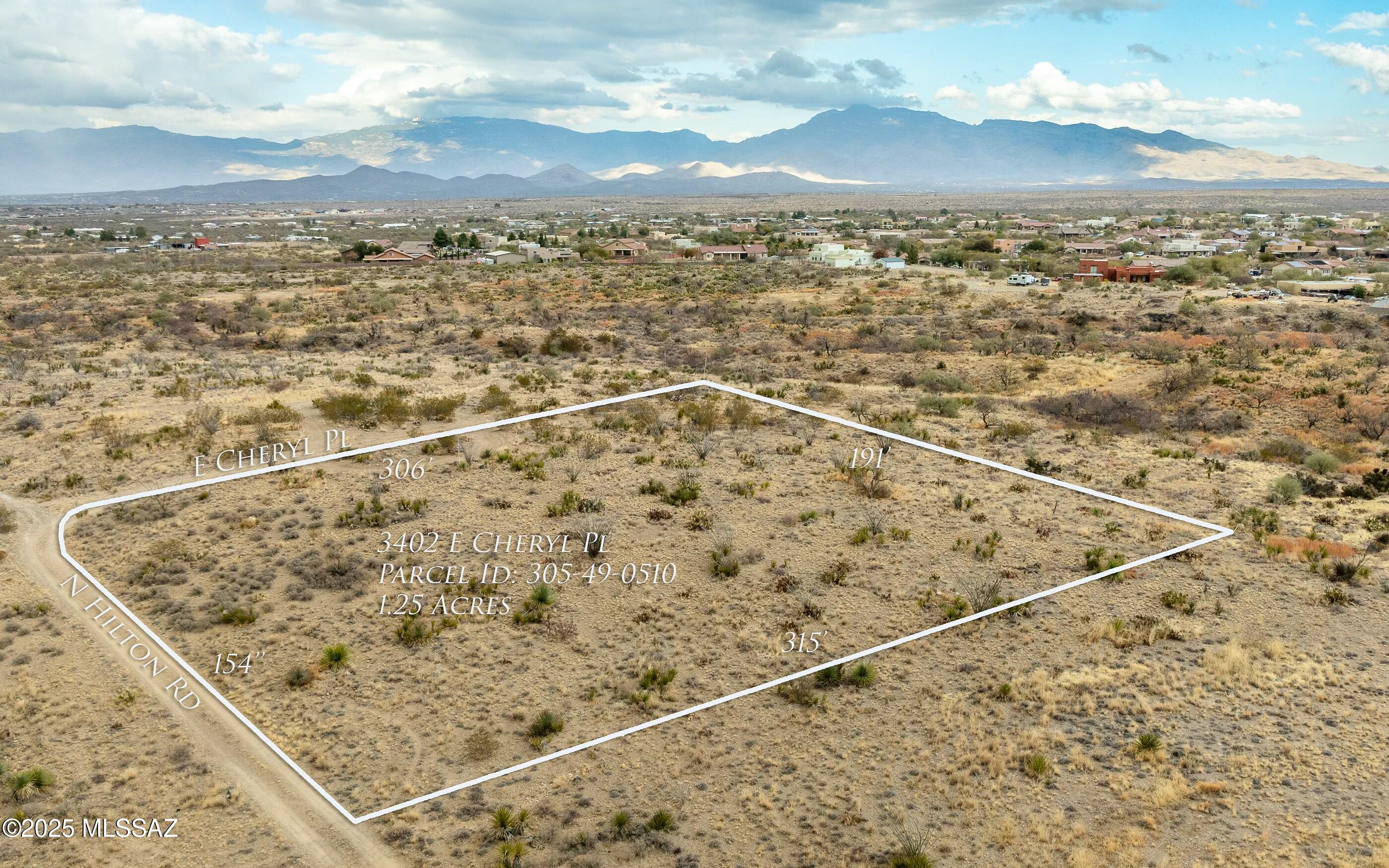 Looking for that perfect lot to design your DREAM HOME... Here It Is!  This AMAZING 1.26 acre lot in the highly sought-after Vail School District is waiting for you. Located on a high lot, at the corner of Hilton Rd and Cheryl Place, you'll enjoy STUNNING MOUNTAIN VIEWS from this tranquil and picturesque site. Horse property by Zoning and, No HOA! Come View it Today!