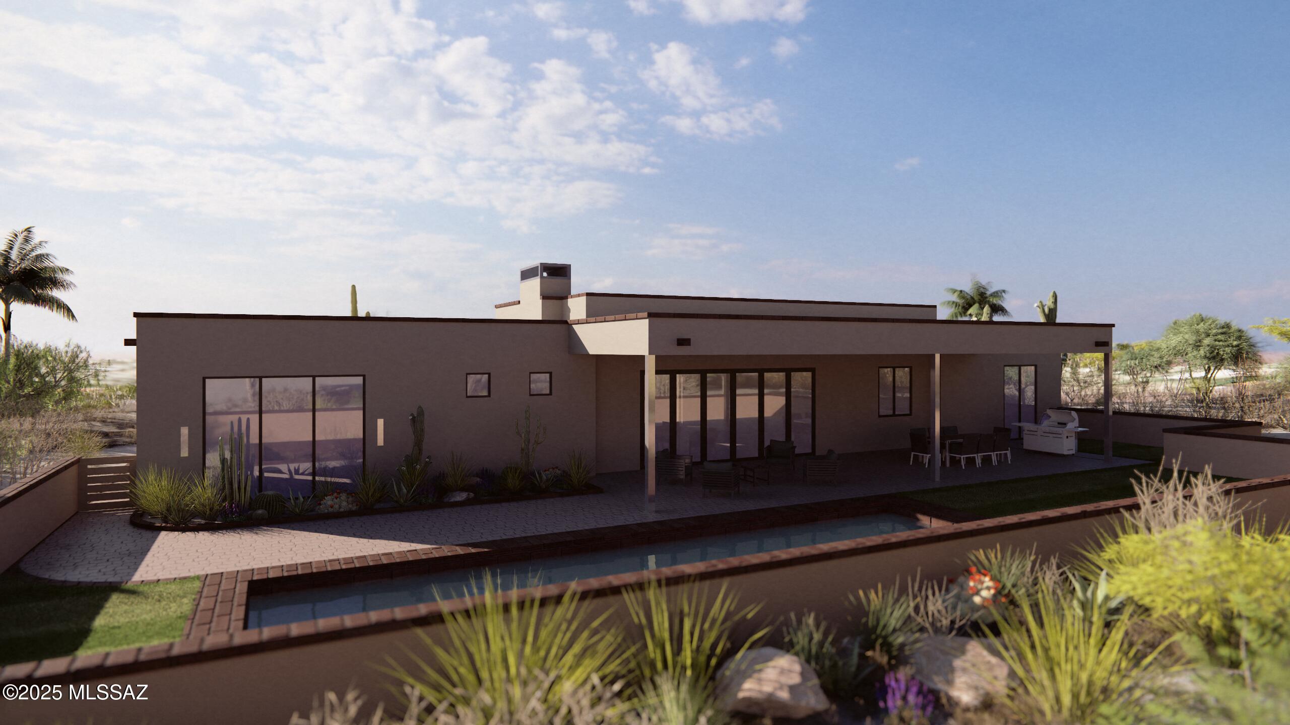 Welcome to your dream home in the heart of Tucson's prestigious Catalina Foothills. 
This brand-new 4 bedroom, 4 bathroom custom residence offers contemporary elegance, thoughtful design, and panoramic mountain views that will take your breath away.
Situated on a spacious lot, this home seamlessly blends indoor comfort with outdoor living. Step inside to find soaring ceilings, expansive windows that flood the space with natural light, and an open-concept floor plan ideal for both entertaining and everyday living. Every detail has been carefully curated with high-end finishes, from the custom cabinetry and designer lighting to the premium tilework and fixtures throughout. The gourmet kitchen is a chef's paradise, featuring top-of-the-line appliances, quartz and granite countertops, and a generous island perfect for gathering with friends and family. A luxurious primary suite is your own personal oasis, boasting a spacious layout, a huge walk-in closet, and a spa-inspired bathroom with a soaking tub, generous shower, and elegant double vanities. Enjoy Arizona's year-round sunshine from the large covered patio in the backyardperfect for outdoor dining, relaxing, or entertainingall framed by unobstructed views of the majestic Santa Catalina Mountains. Don't miss your chance to own this one-of-a-kind desert retreatluxury, privacy, and natural beauty all wrapped into one spectacular home. Expected completion in August 2025. Renderings are an approximate representation of finished building. Contact builder for details. Pool and landscaping not included in listing price.