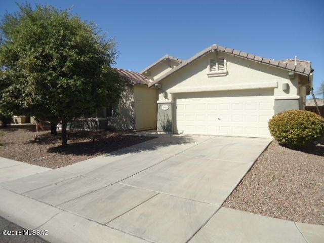 Beautifully done 4 bedroom 2 bath home. Features include ceramic tile, gas fire place, stainless steel appliances, master bed has a bay window master bath has his and hers sinks separate tub and shower. Back yard features build in bbq, fire pit and natural grass.