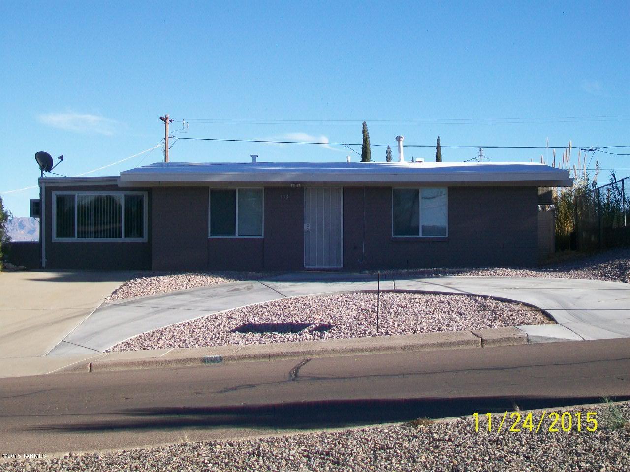 This home is immaculate! Spacious kitchen with stainless steel appliances: (refrigerator, stove, microwave and dishwasher) and garbage disposal. Remodeled bathroom, laundry room, den or 3rd bedroom, 2 flagstone sun patios, fenced back yard, concrete circular driveway, back covered patio and workshop.