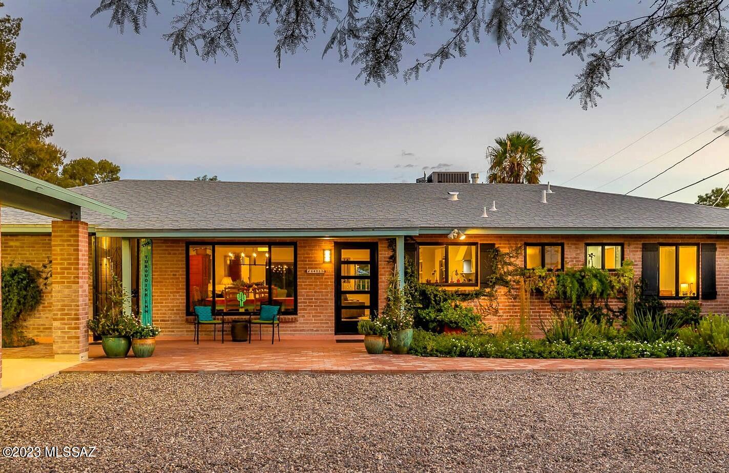With Love & Imagination, this Harold Bell Wright Estates Treasure has Transformed into  a True Desert Oasis. With Vision & Persistence, this Interior Designer's Personal Home has been Comprehensively Renovated. Spacious .56 Acre Lot Offers Endless Versatility. Beautifully styled Double-Brick Ranch Primary Residence a Charming Intro, followed by the stunning ''Turquoise Inn'' Guest House/Vacation Rental. Separate Office, Laundry Room & Outbuildings. The epic Final Act (for now)...the 2023 Renovated ''Cottage'' could be Corporate HQ, Fitness or Art Studio, etc. Historic Designation keep Property Tax remarkably Low. Each Building Completely transformed w/ new Mechanical Systems, Windows, Kitchens, Baths, Flooring, etc. 7000  Sq Ft Flag Lot Can be Split Off. Agent/Owner