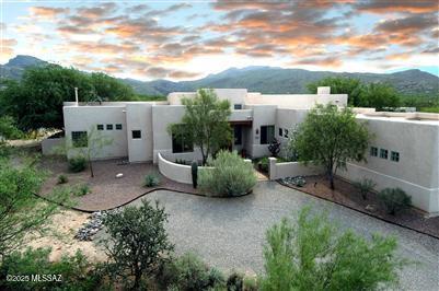 Coming Soon...Main house has 3 bedrooms plus den, 2.5 baths and a 260 sf guest house studio with full bathroom. Beautiful pool with lovely mountain views. Gated front entrance and immaculate landscaping. Paver driveway takes you to a 3 car garage.