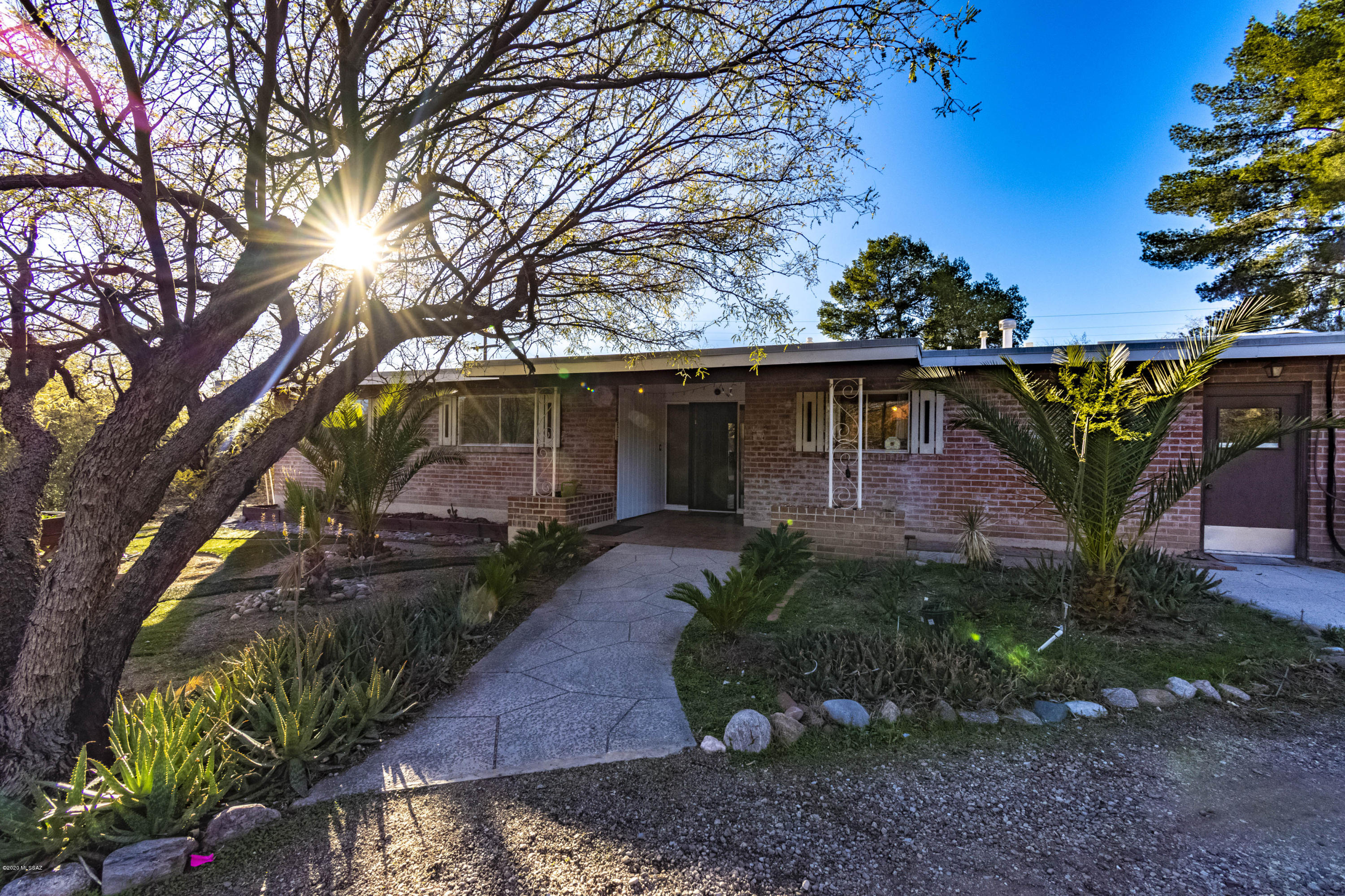 Great home on large lot. Three bedrooms, two full baths. Very private lot with lots of trees and mature vegetation. Two areas with covered parking. A circular drive way makes getting out on Bear Canyon Rd easy. Two beautiful fish ponds out front, pool in the rear. Garage has been enclosed and is not calculated in the square footage. This home has a lot to offer.