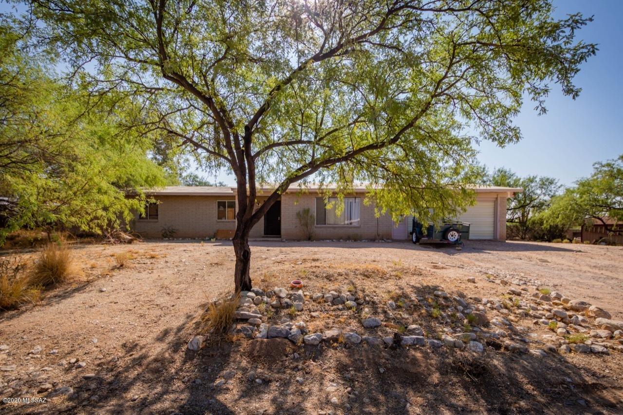 Location, Location, Location!  This one owner home has mountain views all around. Lots of great things to note about this house and the potential is sky high!  Great size lot is under an acre but feels more expansive.  Detached and oversized two car garage + bonus room. Pool with gazebo! Enclosed AZ room and expansive patio.  Original 2 car garage is now a craft room but can be easily converted back to a 2 car garage. 4 great sized bedrooms, and 2 bathrooms.  Home being sold as-is! BRING ALL OFFERS!!