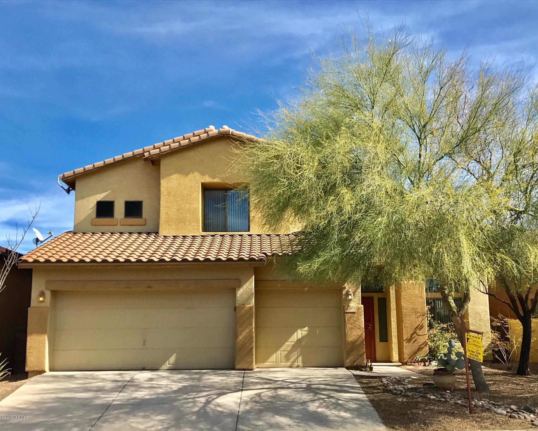 Mountain Views,  Pool, and Vail School District... What more could you ask for? How about Granite Counter tops, brand new neutral tile throughout the entire bottom floor, wood laminate on the 2nd floor.  There is absolutely no carpet in this home.  The kitchen is open and bright with newer stainless steel appliances, large stainless steel sink.  The upstairs offers a loft area perfect for a game room.  The master is downstairs with double door entry, large master bathroom with separate shower and tub, large walk-in closet, double vanities.  Come see this great house just waiting for its new owner.