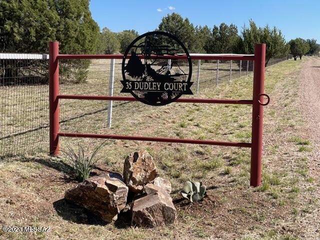 RARE FIND! Beautiful very private park like setting on 8+/- acres. 360 degree unobstructed views of numerous mountain ranges w/sunrises/sunsets. A very nice 2 BD 2 BA home nestled up to the National Forest w/direct access. All trees trimmed to Sonoita Fire dept for a buffer zone. Perimeter fenced w/no climb horse fencing. House being sold completely furnished. Kitchen has stainless steel appliances w/large oversized sink.  Dining area with sitting area around gas fireplace. Pantry w/freezer. Laundry with 1/2 bath, oversized sink, storage closet and utility area. Large Master with new 2 sink vanity w/granite counter tops. Guest BD w/large walk in shower & closet. Spacious LR w/fireplace. New  vinyl plank flooring thru-out.  48' x 48' x 10' metal drive thru bldg. 3 large horse stalls, 2 BD 1 BA guest house w/kitchen living room and two mini-splits. 2 car oversized garage. West Coast spa included. Truly one to see.
