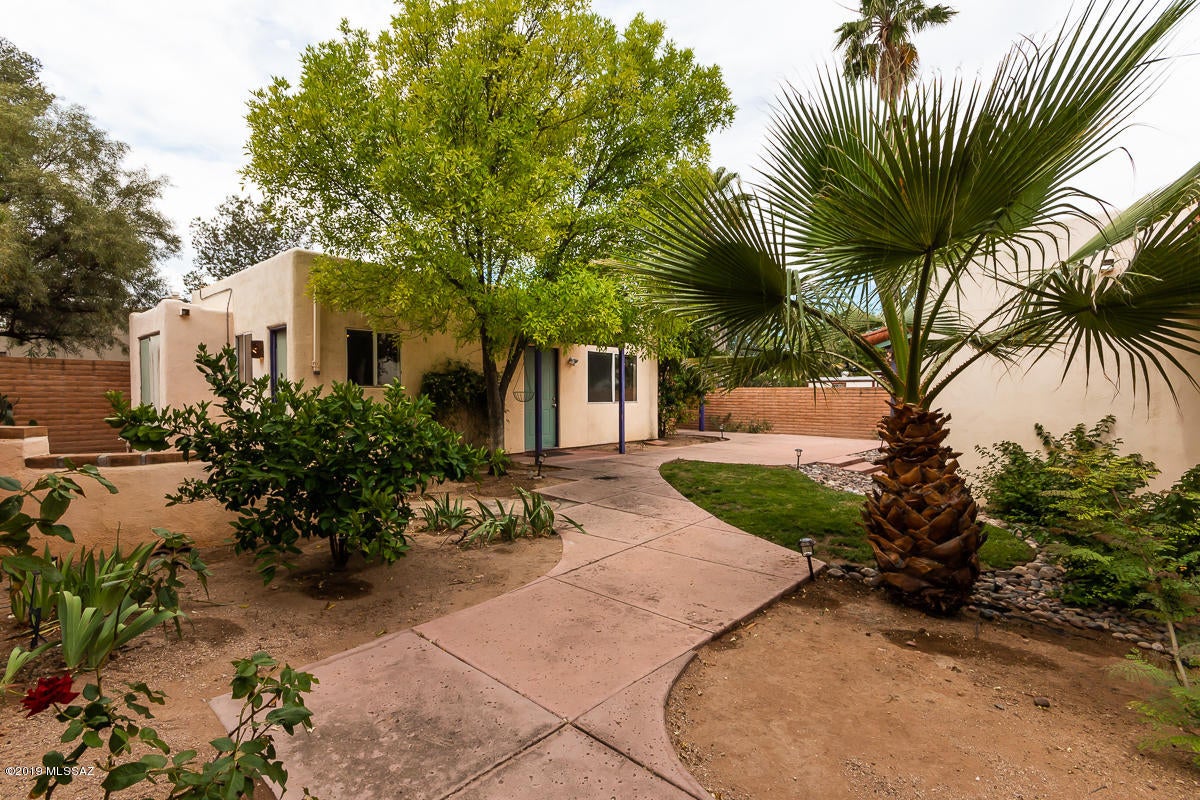 Landscaped yards, covered patio,  storage rooms and laundry room Close to UA & UMC!
GH-Studio for $600.00 plus $150.00 for gas, water, electric and gardening. 
Main house and GH can be rented together or separately. NO DOGS.
refer to MLS #21912884