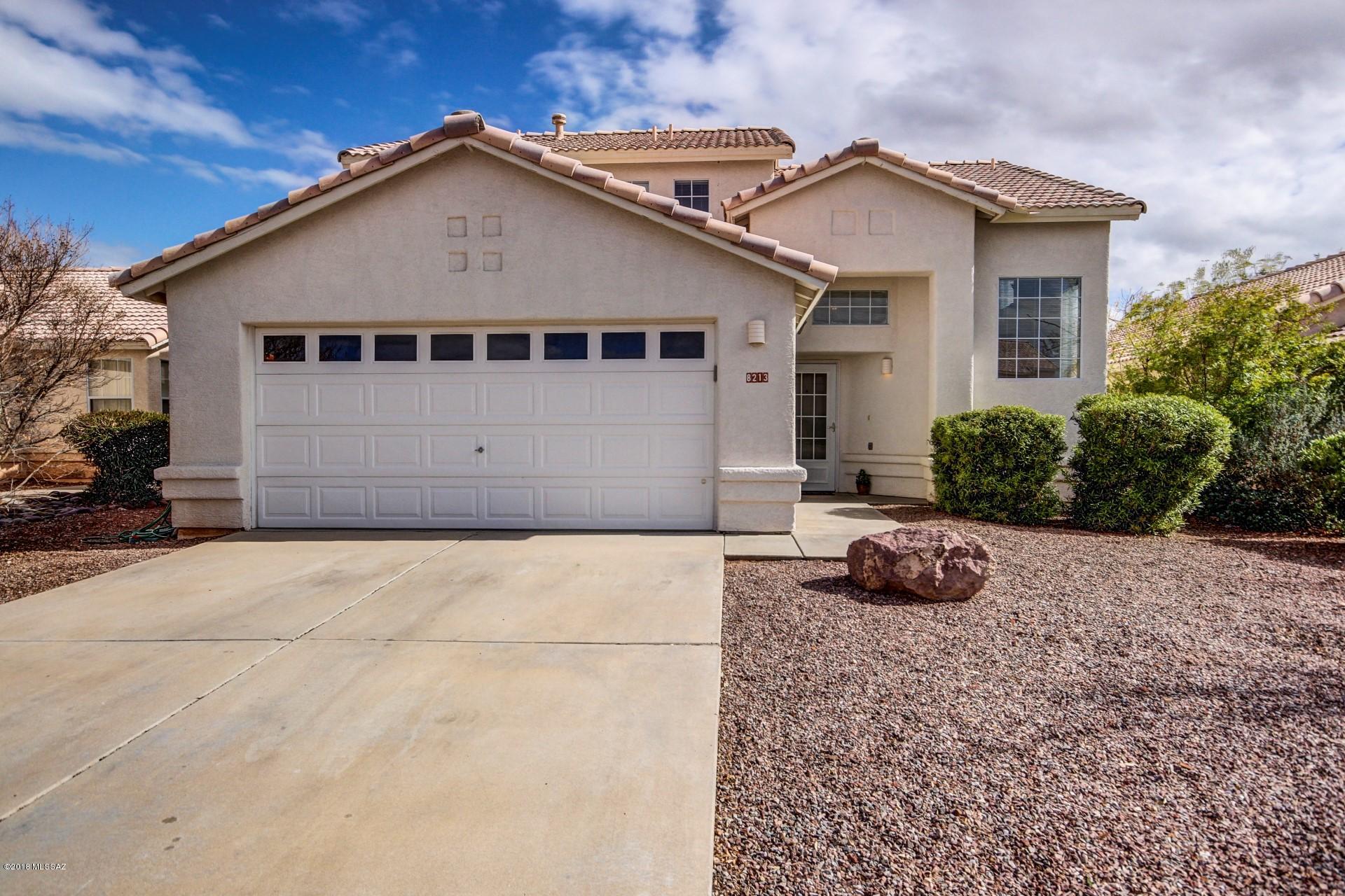 WELCOME to this Beautifully Updated Home in Rita Ranch! Located in the Award Winning Vail School District and Conveniently Situated 1 Block from Desert Willow Elementary and Purple Heart Park.  Fantastic, Move-In Ready Home Featuring a Gorgeous Kitchen Equipped w/SS Appliances, Corian Countertops, Beautiful Cabinetry, Custom Built Island and Plenty of Storage.  Sliding Glass Doors Lead to the Expansive Covered Patio and Manicured Backyard. Inviting and Open Great Room; Sophistically Updated w/Beautiful Laminate Flooring, Gorgeous Window Blinds and Stylish Ceiling Fans.  Well-designed Master Provides a Huge Walk-in Closet, Dbl Sink Vanity, and Walk-in Shower.  Add'l Bedrooms are Spacious w/Ample Closet Space. 
Don't Miss Out!  Stop by Today!