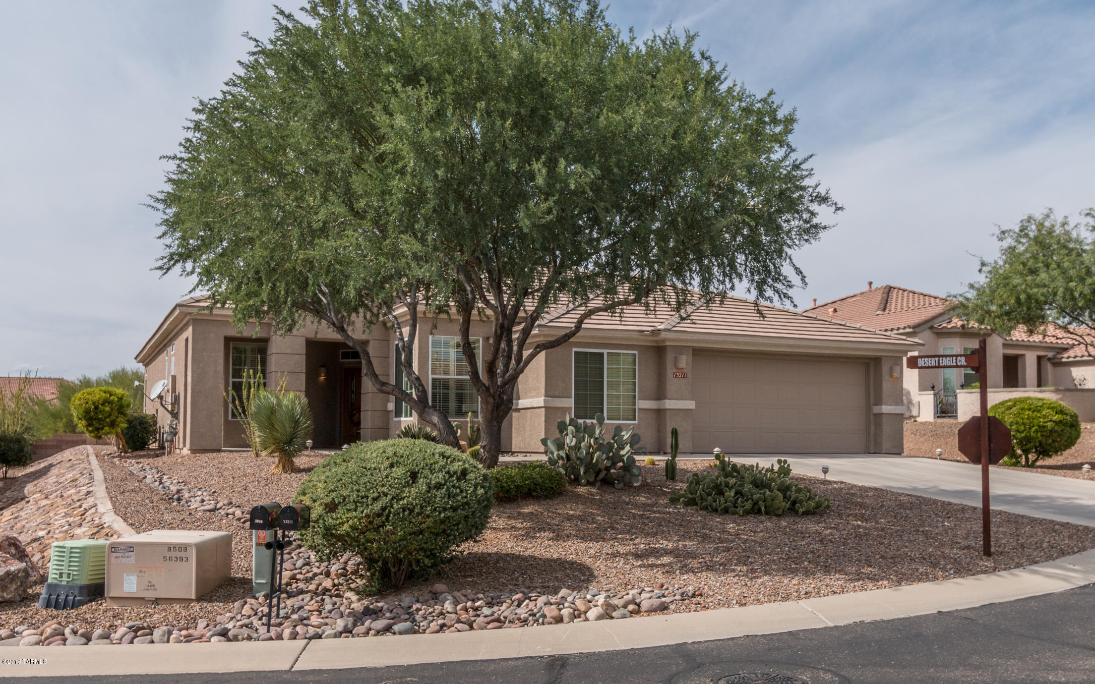 Great space, great upgrades and great views!This home has it all in the most desirable Acitve Adult Community, The Highlands at Dove Mountain. You need to see this home soon. Large Tahoe with 2407 sq ft; 2Br/2Ba + Large DEN area. Formal dining room. Wait till you see this entertainer's kitchen w/Corian counter tops, extended maple cabinetry and all SS Appliances included. Fabulous family room w/stylish media inserts and room for any size TV. Dining area off kitchen w/bar style seating. Large master bedroom suite w/bay window & plantation shutters, coffered ceiling & custom fixture. Luxurious master bath w/separate tub & shower & double vanities. Terrific walk-in closet makes it a great space. Now step outside to the backyard oasis w/extended paver seating, raised paver seating area - VIEWS gas fireplace, sunshades, lush landscaping and enjoy the incredible sunsets. You will know you have arrived in this amazing home.
