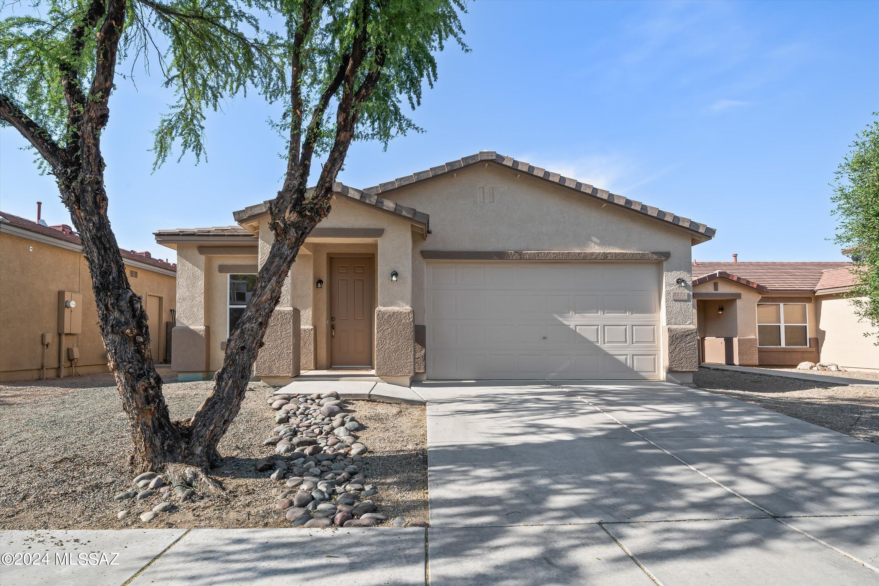 Nestled in the charming neighborhood of La Cholla Bluffs, this 3 bedroom open floorplan home offers everything you need including new appliances, new HVAC, freshly painted, finished garage and much more. Additionally, it is conveniently located within a short distance to all the amenities and attractions Tucson has to offer. Come take a look!