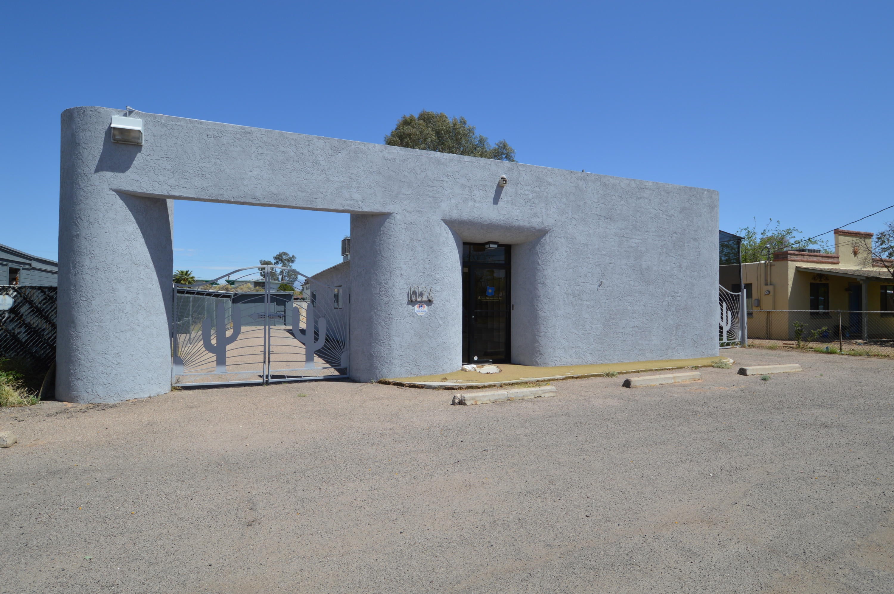 Perfect for contractor, office or any C-1 use.  This building has 6 office spaces with storage, bath and kitchenette.  Fully fenced for security. Detached storage buidling.