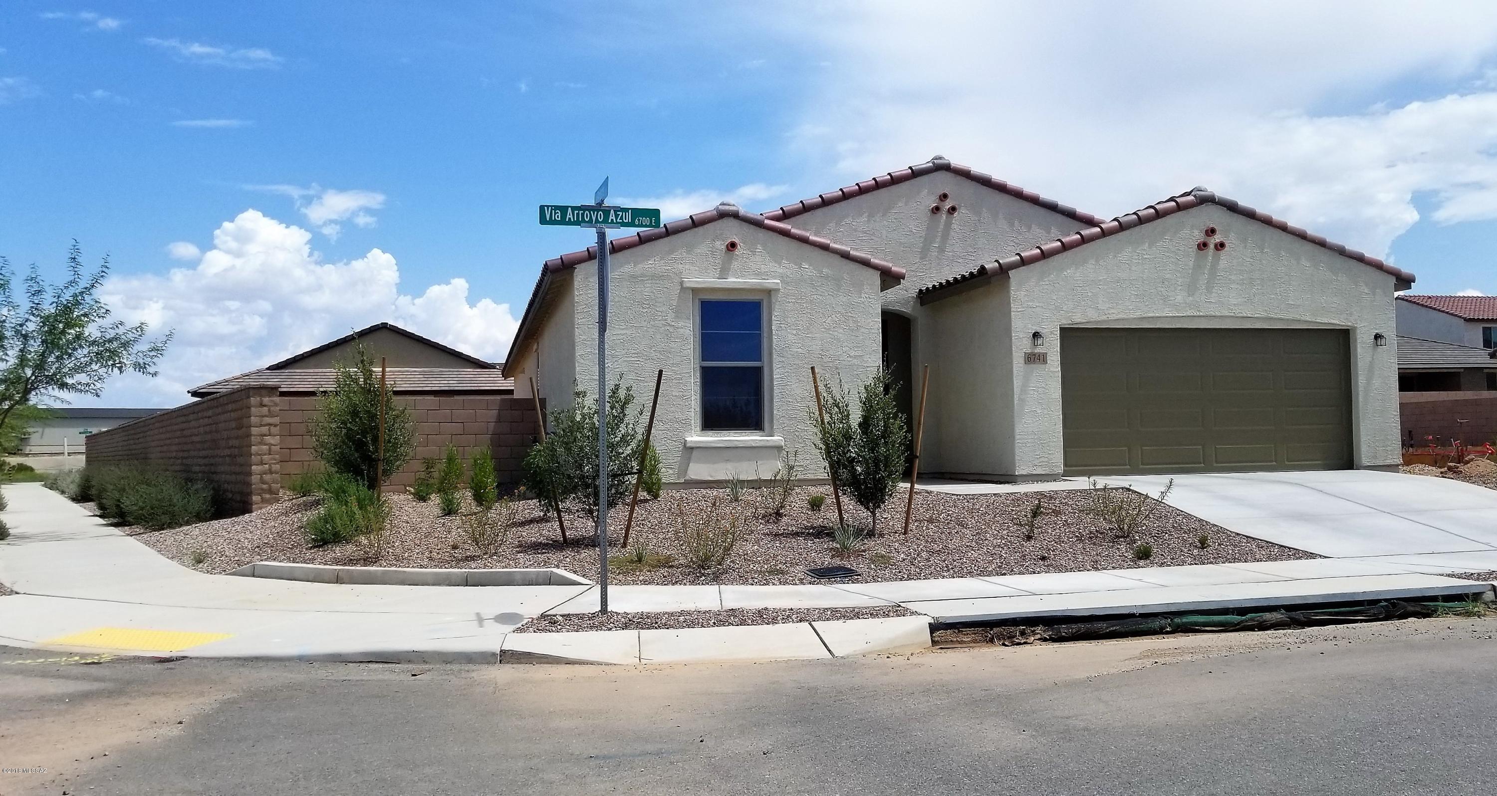 Why buy new when you can have a home lived in only 3 months? This beautiful home has lots of upgrades and a larger lot than most in the neighborhood. Some upgrades include double doors on the first bedroom as you enter the home that also doubles as an excellent den. Granite counters in the master bathroom, executive height cabinets with drawers, one cabinet with recycle/garbage bins, 36' maple flat panel kitchen cabinets with 2' crown molding, reverse osmosis system at apron front kitchen sink, subway tile backsplash in kitchen and master bath, gas range, upper cabinets in laundry room, ceiling fan prewires, window coverings in great room and master bedrosoft water loop in garage. The backyard is a fresh landscape ready for your personalized touches. Call now for your private showing.