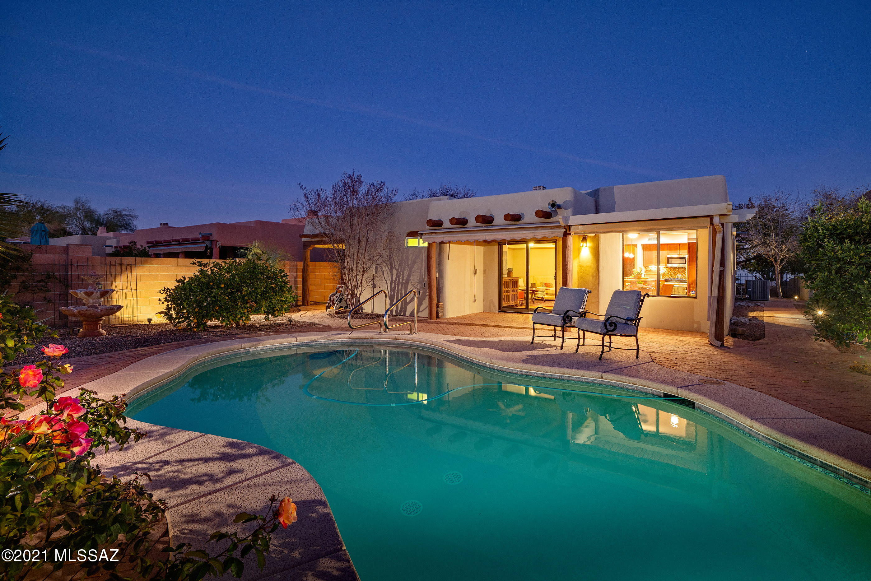 This incredibly well-maintained TJ Bednar home exudes charm and character! Interior appointments include a stunning vega beam cedar ceiling and a cozy beehive gas fireplace. The chef's kitchen features a large center island, granite counters, stainless appliances, an abundance of cabinetry, a built-in desk space and opens to the cozy family room. The master suite showcases a beautiful walk-in shower with tile surround & new glass enclosure, double vanities, & a walk-in closet. The split bedroom floor plan features 2 additional bedrooms and a remodeled bathroom with stunning surround tile, glass enclosure, new vanity and custom mirror. The private backyard offers two covered patios, with one perfectly situated off of the master, a sparkling pool, water fountain and a spacious side yard with plenty of citrus trees.