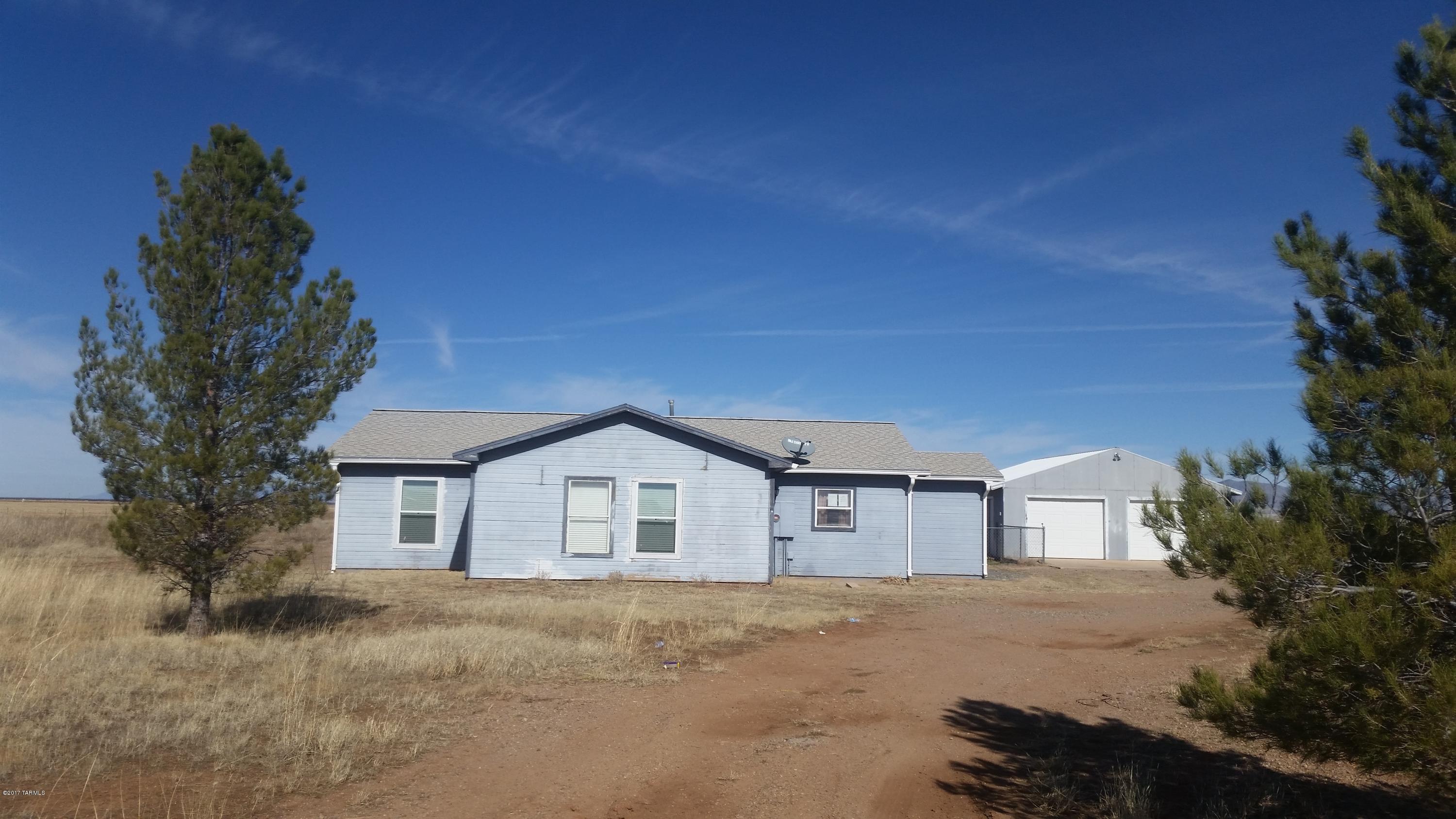 Great 3 bd , 2 bath home on 4 acres in Kansas Settlement . Has a nice 2 car garage and fenced yard. Home does not have a heating or cooling system.