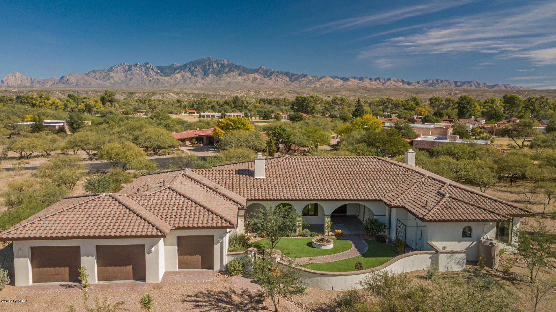 Luxury custom 3 bdrm/3 bath home on 1.63 acres overlooking the 5th fairway of the Otero course in the prestigious 4-star Tubac Golf Resort has everything you need or want in your home.  Views of the mountains and golf course from the expansive windows enhance the architectural features of this beautiful home.  There is a comfortable flow that extends from the spacious living room, through the dining room to the gourmet eat-in kitchen.  Master bathroom has separated sinks for privacy.  The walled yard, which includes fruit trees and desert plantings provides privacy but does not obstruct the mountain and golf course views.   Come live in Tubac surrounded by peace and beauty.