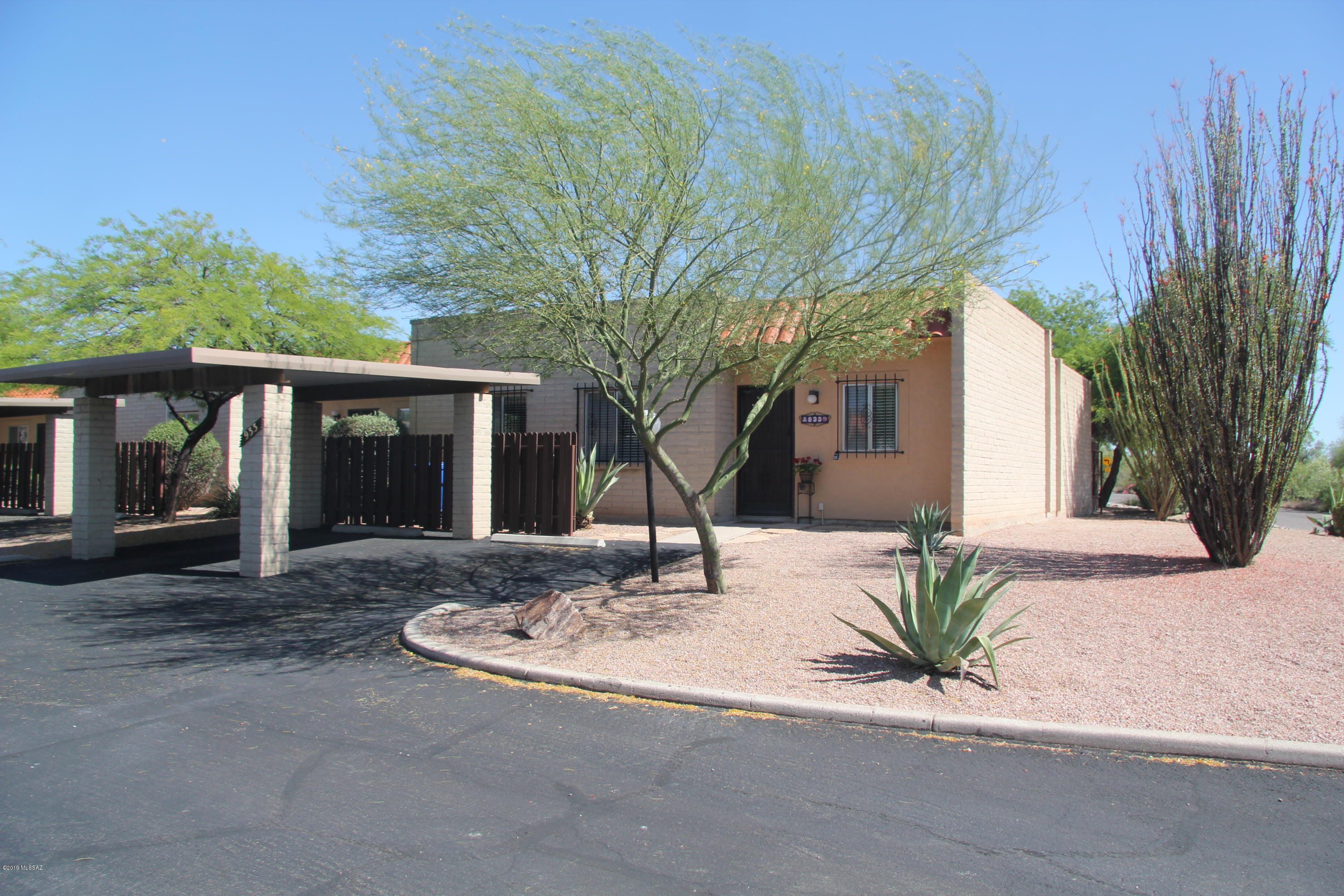 Highly desirable townhome in the heart of Tucson's Eastside.  Upgraded kitchen with corian counters and black appliances. Upgraded bathrooms with new vanities.  3 good size bedrooms with new carpet.  Large open floor plan.  Townhome is a corner unit that is adjacent to a river walk/bike path.  Great opportunity to own a great townhome.  Move in ready and these units go fast.  These make great investments.