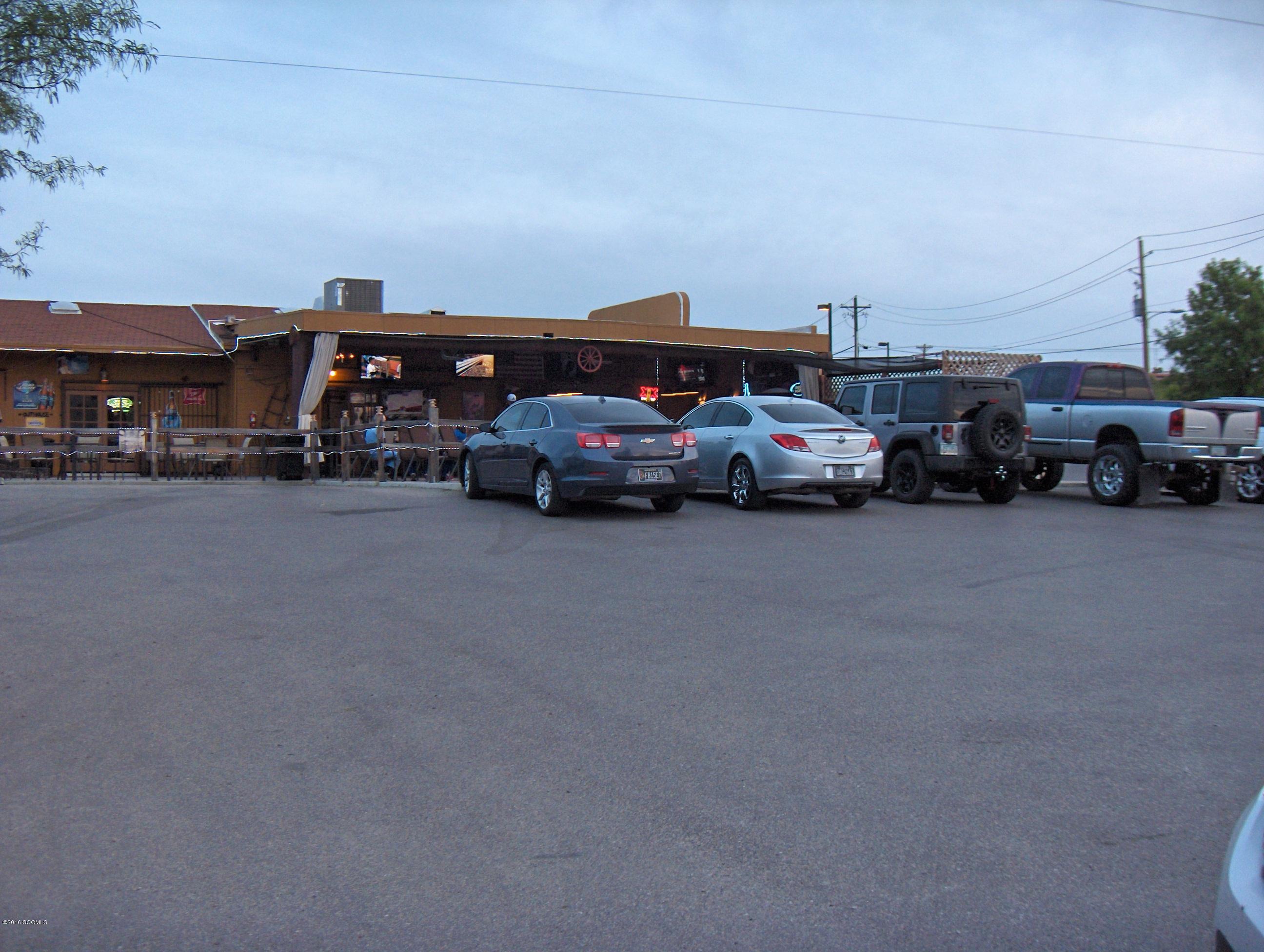 Great business opportunity, property has 4 lots, includes liquor license #6 and all personal property and inventory.[] refrigerator, pool tables, furniture, all. Building is 1467 sf,north side canopy is 847.44 sf, open slab is 2867.16 sf., front canopy is 208.80 sf.[] This property is considered to be OUT of the special flood hazard area.