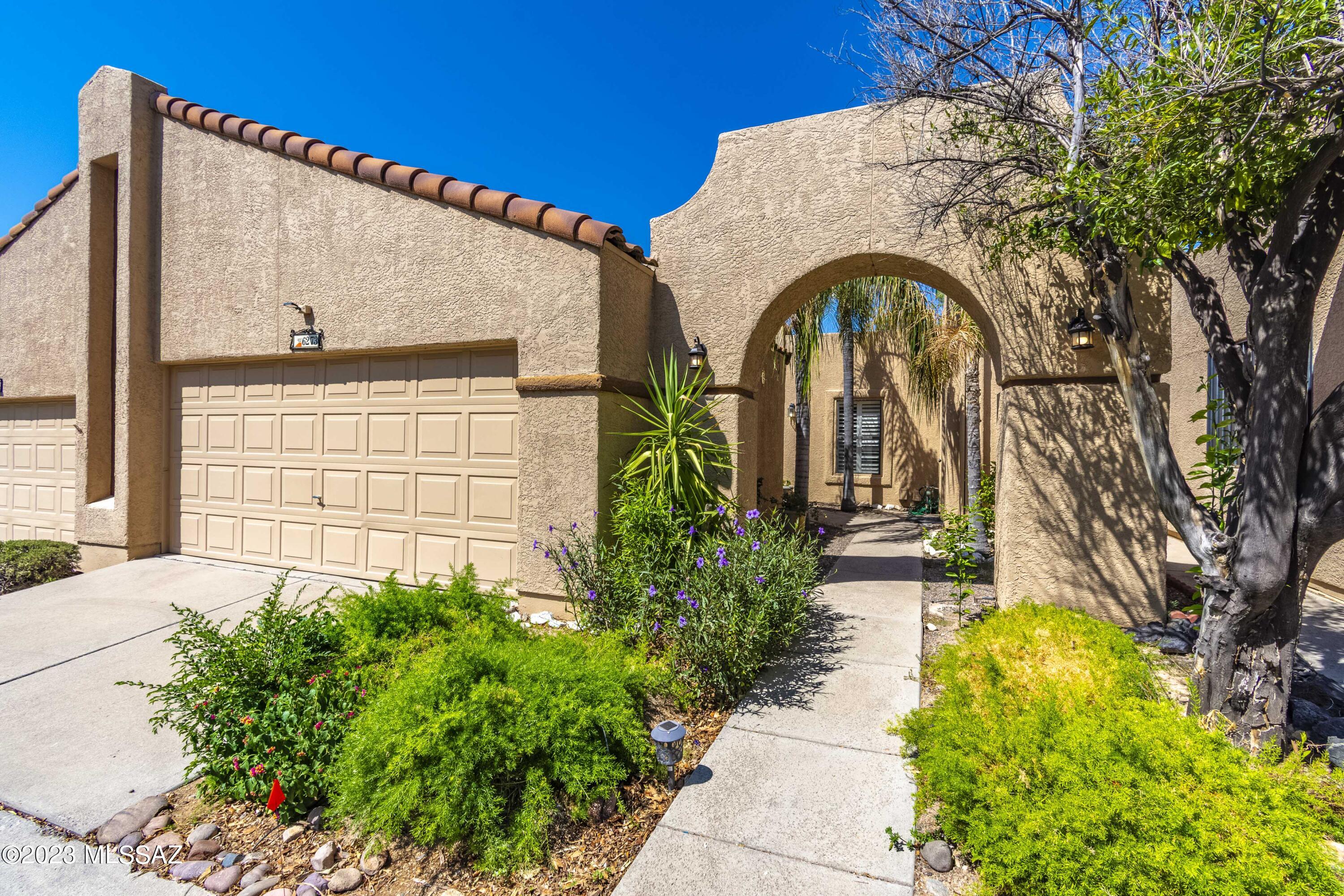 Great opportunity to own a conveniently located 3 bedroom/2 full bath townhome with a 2-car garage in a quiet, well-kept community.  The inviting courtyard entry has a hidden storage room, in addition to the large garage. Some of the home's bonus features include; newer HVAC, roof recoating (Aug 2023), a freshly painted interior, and professionally cleaned interior. This home has a flexible split bedroom plan and a large great room leading to a generous sized covered patio yard.  Kitchen is ample with a pantry and eat-in area. Community/HOA includes 2 pool/spa area with a lovely fountain and landscaping, rec space, small gym, small grassy park, covered area for outdoor enjoyment, BBQ area, and plenty of guest parking.