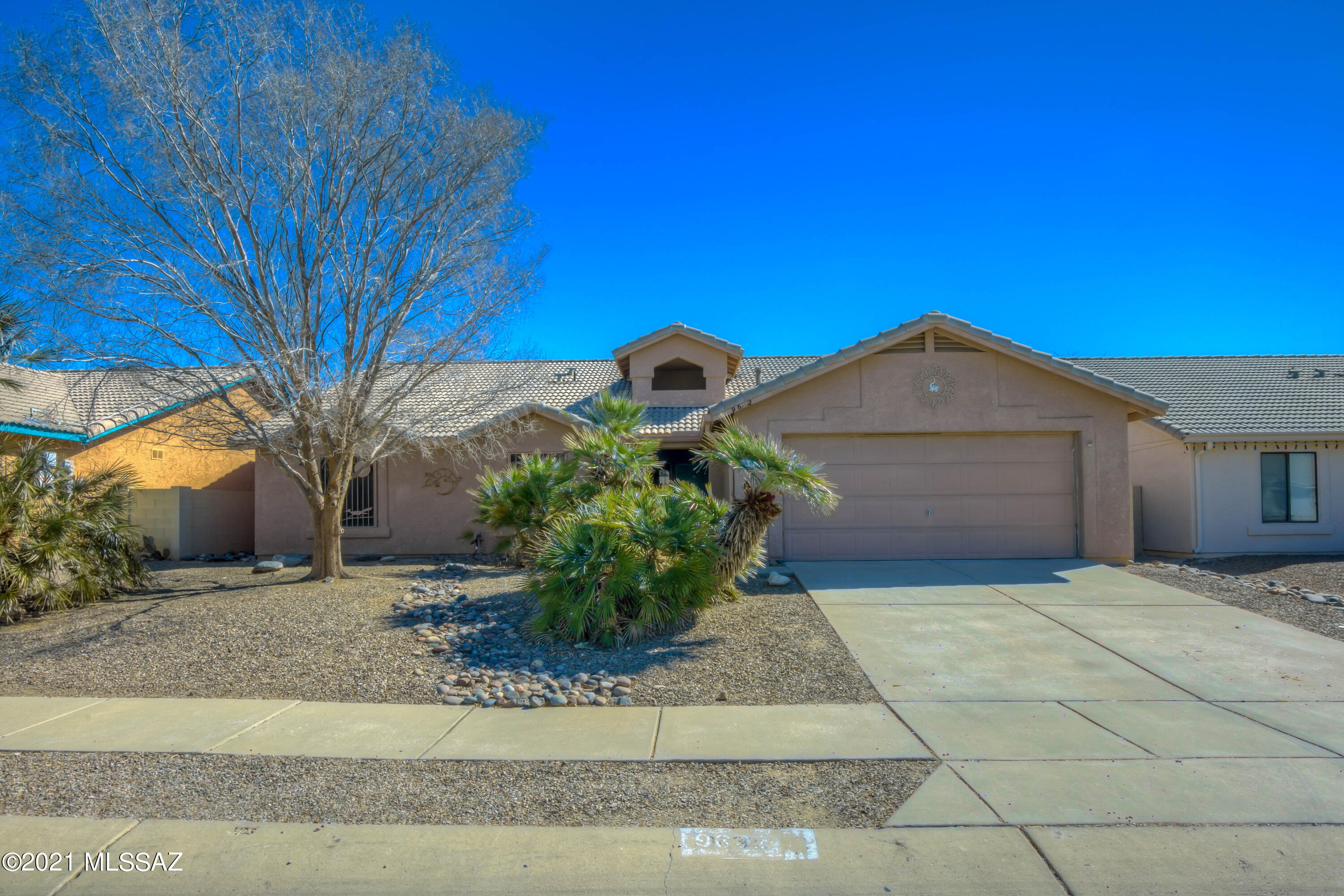 Large 4 bedroom 2 bathroom home needs some cosmetic love but has fabulous potential and a great price! Large enclosed back patio to keep your pets safe. Single level home, no steps and wide hallways. This pocket of Rita Ranch has no HOA, and is a great location close to schools (Vail school district!) and across the street from Purple Heart Park.  A few minutes' drive from shopping and entertainment, and an easy drive to the freeway. Location is a huge asset for this home. Great potential. Hurry!