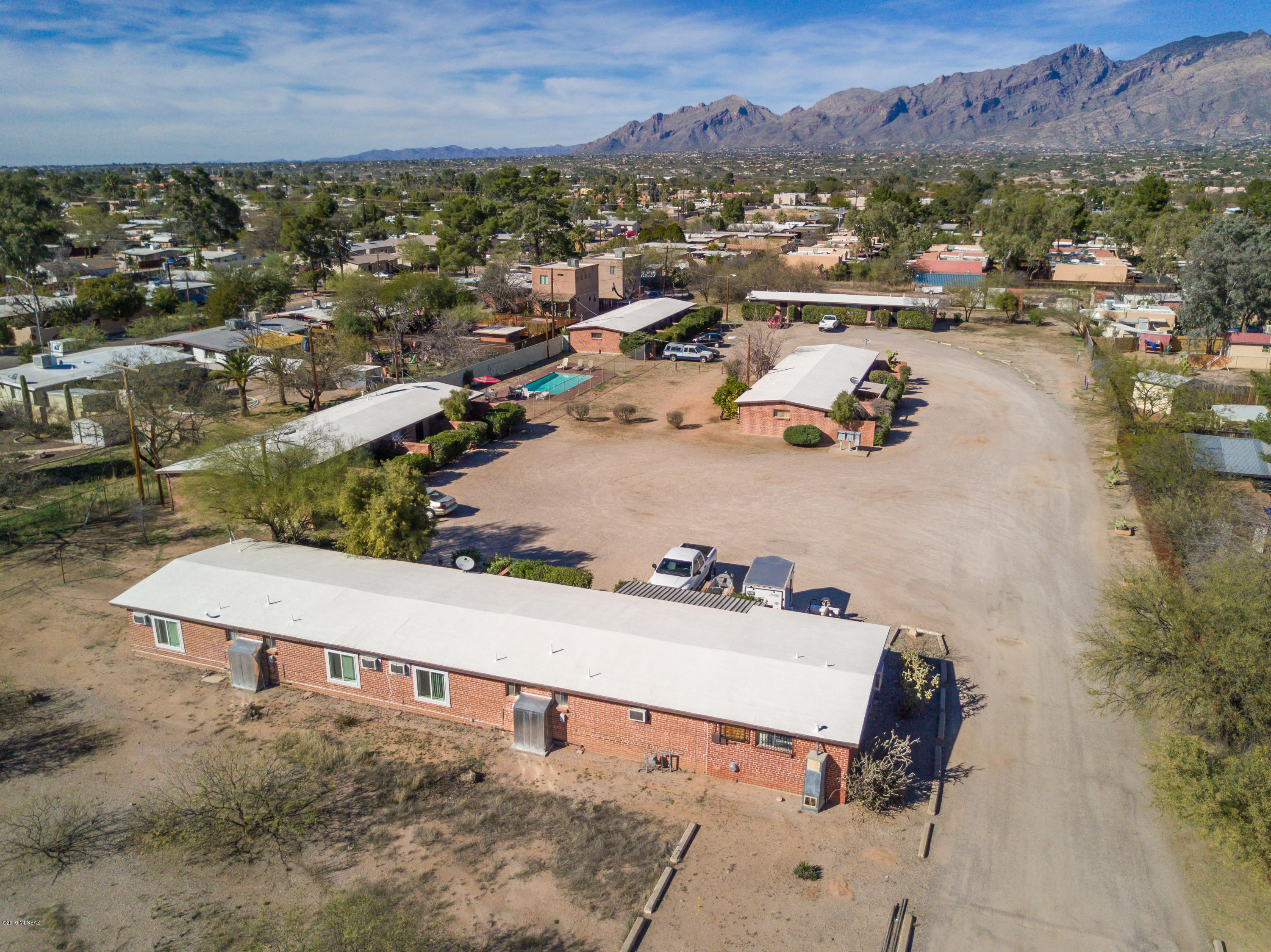 Unique ability to initiate an Opportunity Zone purchase and development on a property that will provide immediate and ongoing cash flow. Currently a 20 unit complex with 5 separate buildings spread over 2 acres of land with the ability with the ability to add 10 more units.