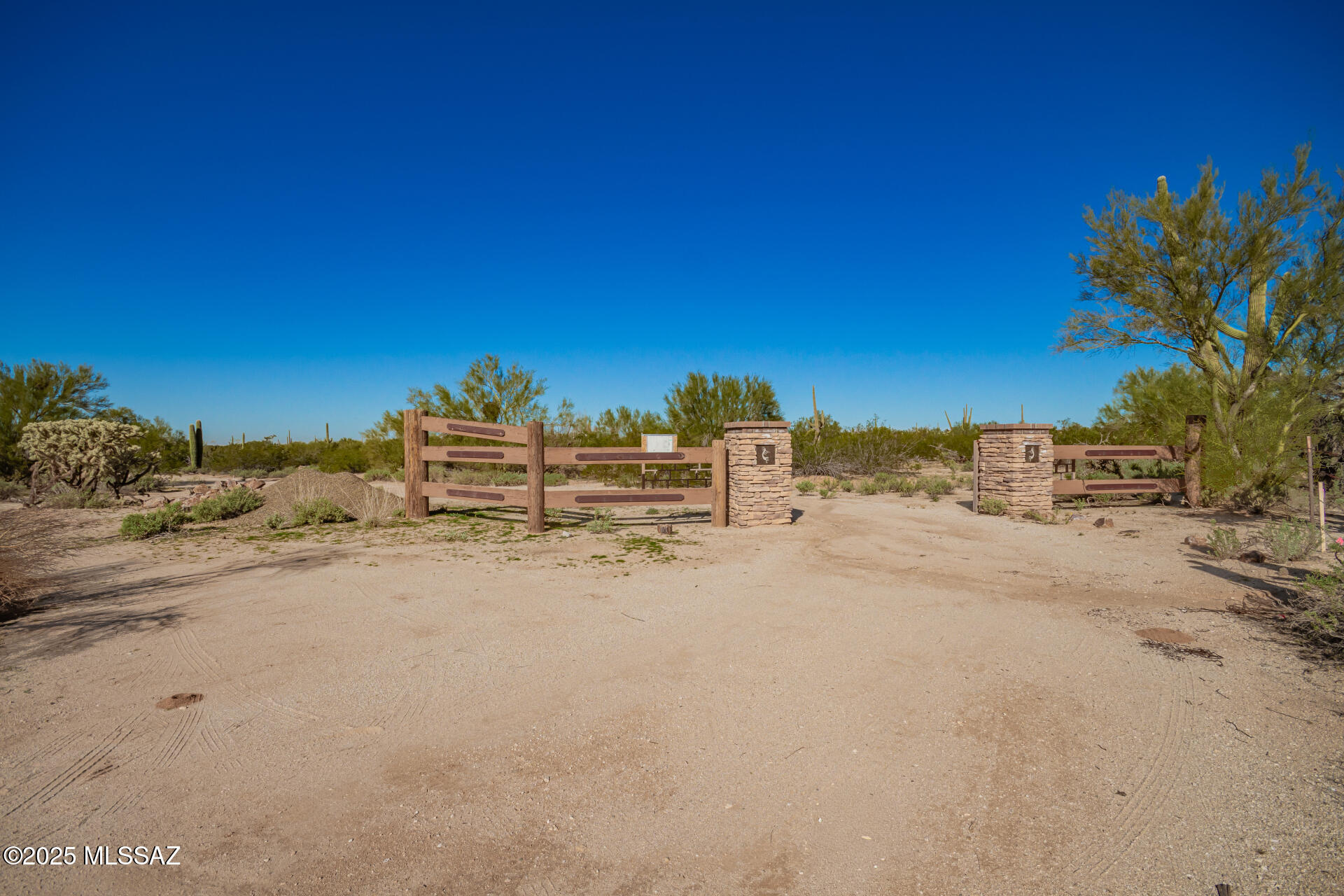 A private half-mile easement leads to the gated entrance of Kokopelli Estates—an exclusive end-of-the-road retreat bordering BLM land. This secluded oasis offers exceptional privacy and tranquility, set against the stunning backdrop of the mature Sonoran Desert. Enjoy abundant wildlife, sweeping panoramic views, and unforgettable sunsets. Underground utilities in place with established road and water well agreements. Four parcels available, each approximately 9.5 acres. A truly rare offering—seeing is believing!