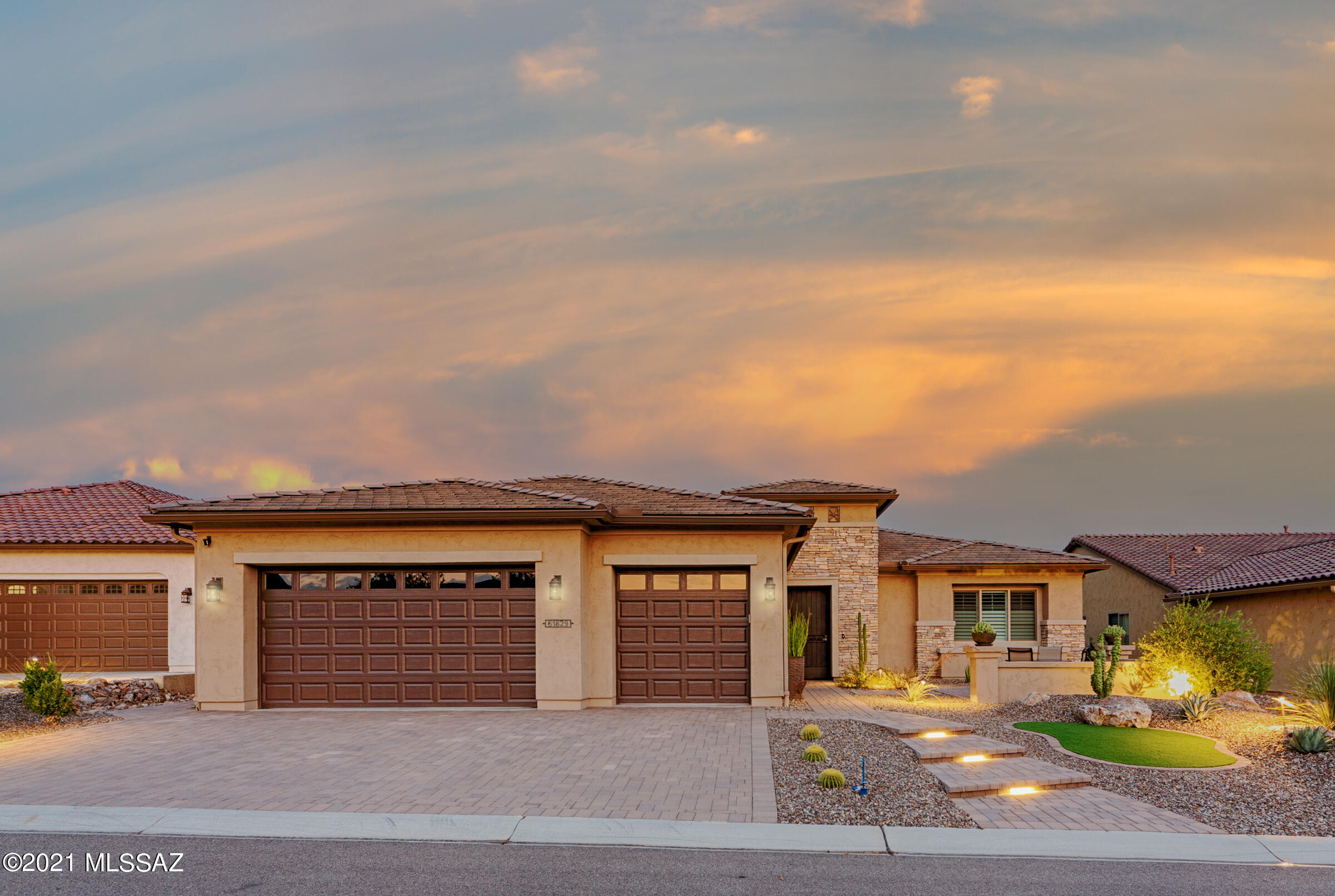 Without a doubt, this incredibly beautiful 3250 square foot Baccara Estate Home has the best view anyone could have living in SaddleBrooke Ranch.  The end result is the largest home that Robson makes currently for this unique Gated Community. It is gently resting on the most prestigious lot one could own here at the 'Ranch'. The home encompasses 3 Bedroom en Suites (w/bathrooms);   Powder Room; Expansive Great Room; Dining Area; Entertainer's Kitchen Island; Spacious Den; Large Walk-in Pantry; Butler's Pantry; Media Alcove in Great Room; Generous Walk-in Closet in Master Suite; Walk-in Closet in Bedroom 2 Suite; Master Bath 42' x 72' Drop-in Jacuzzi Tub & 60' x 50' Shower and Built-in Seat; Walk Up Dry Bar; Large Laundry Room; Deep 3-Car Garage; 558 sq. ft. of Covered Outdoor Living Space; 10' & 12' Ceiling Heights; Extra Storage Space in the Expanded Garage, and a great deal more than we can tell you here. Owner-added amenities worth mentioning though are custom made security door for front outside entrance w/Ring doorbell, Over-head Storage Racks and cabinets in Garage w/Side Door, and Tucson Rolling Shutters on Back Covered Patio, and High-end GE Monogram Appliances.  The Washer, Dryer and Indoor Refrigerator come with the sell as well. 

The View - when one walks in the front door you are immediately transfixed by the view through the windows. When you get to the back covered patio and then on to the immaculately cared for back-yard you are simply overwhelmed by the mountain range in front of you! You can see from the small town of Oracle to the north, south to the majesty of the 10,000-foot-high Mount Lemon, and then all the way down the Catalinas to just north of Tucson.

If you are that discriminating buyer that is considering making the move to SaddleBrooke Ranch and wants all that this awe-inspiring 55+ Active Lifestyle Golf Community can give you, then this is your opportunity to have it.