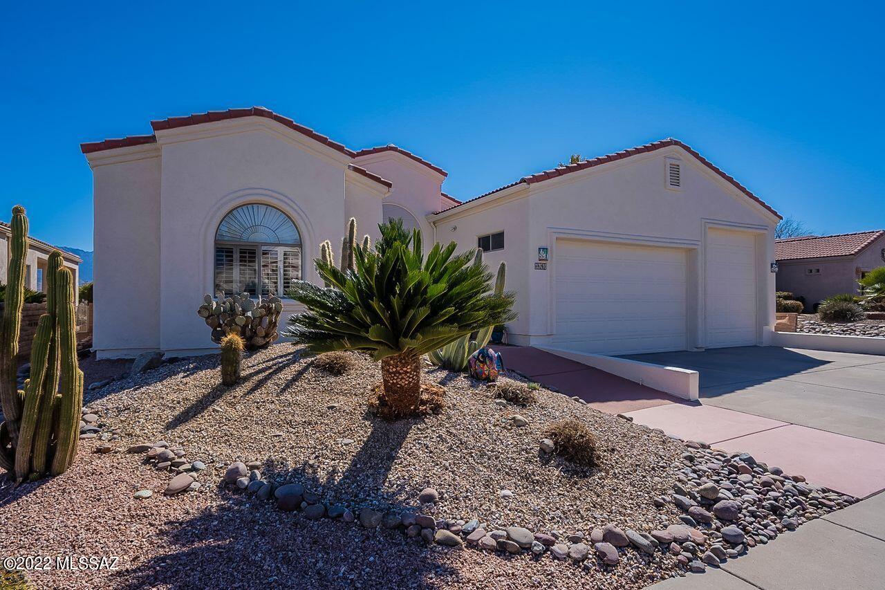 Situated on a premium golf course lot at Torres Blancas Golf in Green Valley, AZ, this home checks all the boxes:  Beautiful Santa Rita Mountain Views from East Patio, nestled in a Gated Community,  Covered RV Parking Garage and more.  The moment you cross the threshold of this exquisitely cared-for home, your attention will be drawn upwards towards the cathedral ceilings of the great room and the mountain views out the east windows.  Your favorite activity in the evenings will be to watch the palette of colors change with the setting sun reflected on the Santa Rita's.  Entertaining will be a breeze  in the up-to-date open kitchen concept with impressive granite countertops, breakfast bar, newer appliances, & added lighting.  Don't miss the list of upgrades that this thoughtful seller has attended to so you can Relax!

Chef's island in Kitchen is Not included with the home.  Sellers' quilts are Not included.