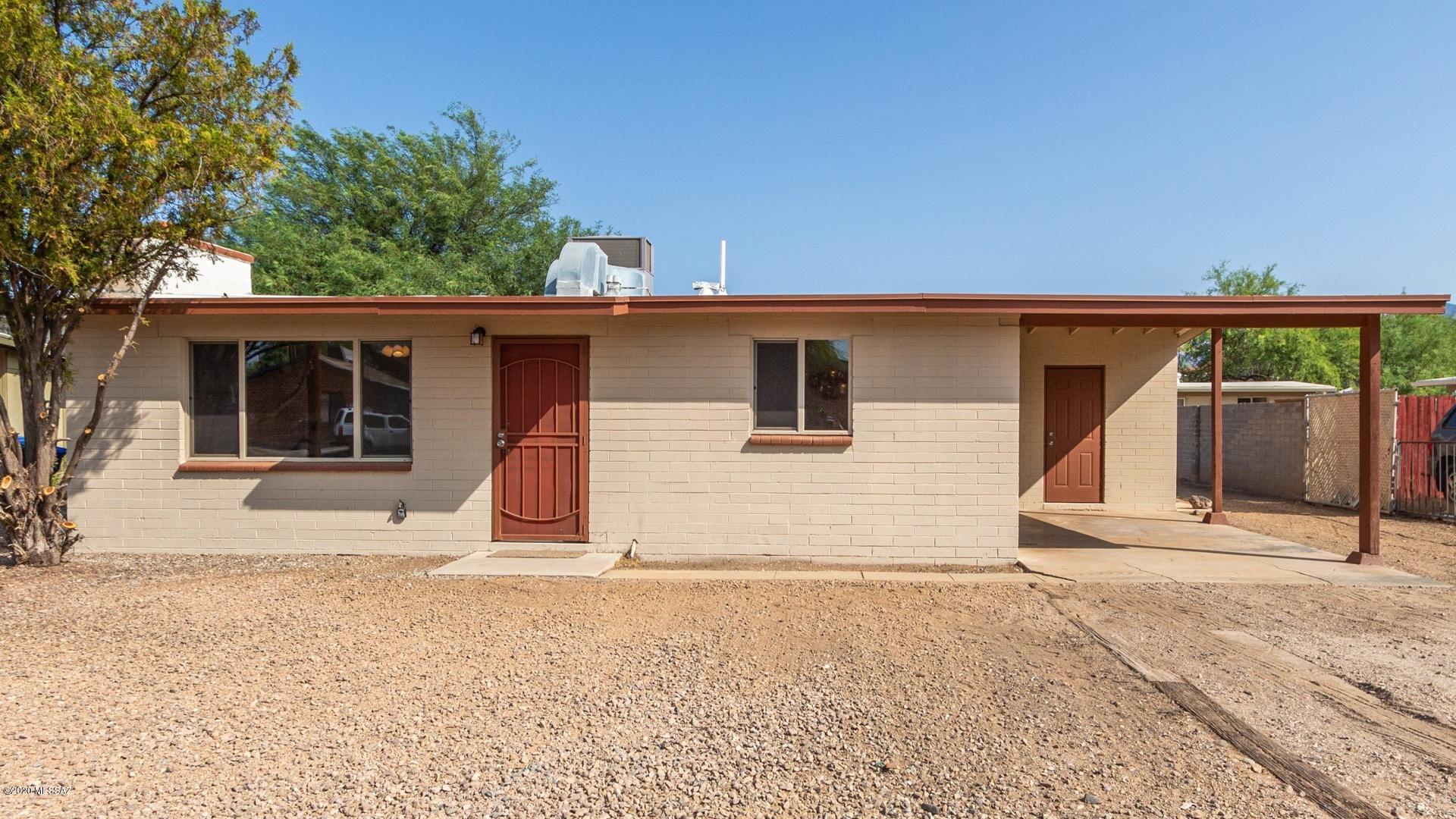 Seller will accept or counter offers from $164,900 - $169,900. This light and bright charming 2 bedroom  home is located in a small, quiet central neighborhood and has an updated kitchen and bathroom, new  ceramic tile flooring fresh paint , . Spacious living room with wood burning fireplace. Huge backyard has large covered patio, storage rm/wkshop w gates for easy access and room for boat, RV and all your toys. move in ready and just waiting