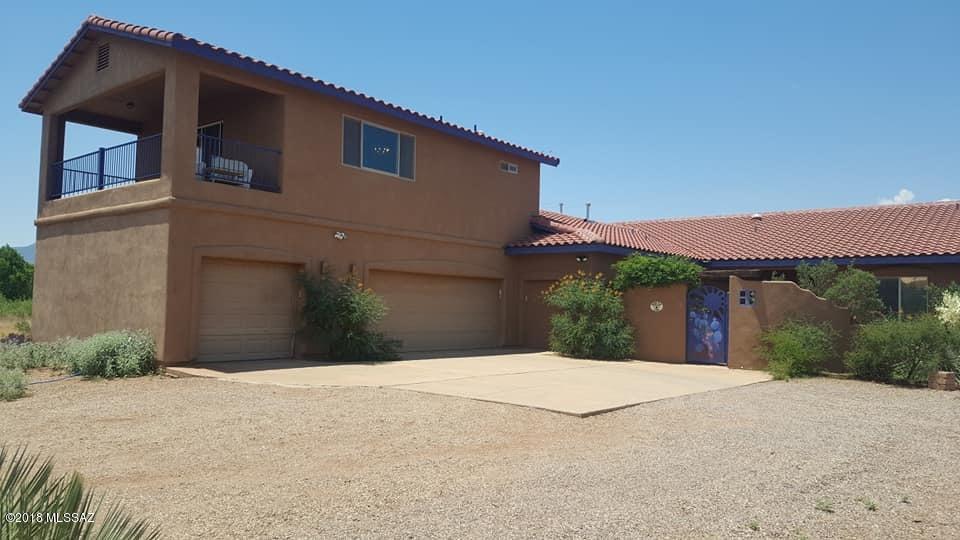 Seller entertaining offers between $299,000 to $325,000. Golf course lifestyle in beautiful Bisbee, AZ! This Stunning David Gray built home boasts upgraded appliances, high end flooring and JAW DROPPING VIEWS from the 17th green at the famous Turquoise Valley Golf Course. Separate and private Guest quarters includes bedroom, living room, kitchen, bathroom and all with it's own private garage and balcony! Property includes a Huge workshop attached to a two car garage. Possible turnkey with the right offer and move in ready! The lot next-door can also be purchased to add on!