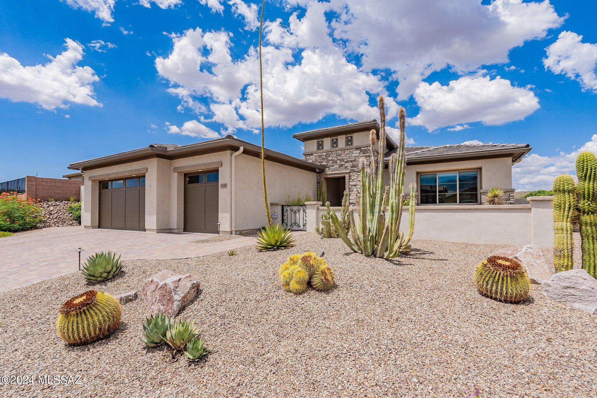 Elevated above 16th hole - stunning 3-suite + den Bacara model in The Preserve at SaddleBrooke - mtn views inside & out, front & back. Great room w/sliding glass wall to tiled patio w/gas fireplace and motorized screens. Entertain around quartz island - kitchen boasts butler & walk-in pantry, induction cooktop, Subzero fridge, Fischer Paykel DW drawers, double oven, trash compactor. Wet bar, wine fridge & ice maker. Primary suite w/rock wall, mtn views from bed & fabulous Closet Trends organizer. Landscaping: extended paver patio, fountain, 2 Texas Ebony & citrus: Meyer lemon, Ruby Red grapefruit, Limequat. Hunter Douglas motorized shades throughout. Den w/French barn doors. Garage has mini-split, cabinets, hanging storage, recirc pump. Owned solar. Ring camera system.
