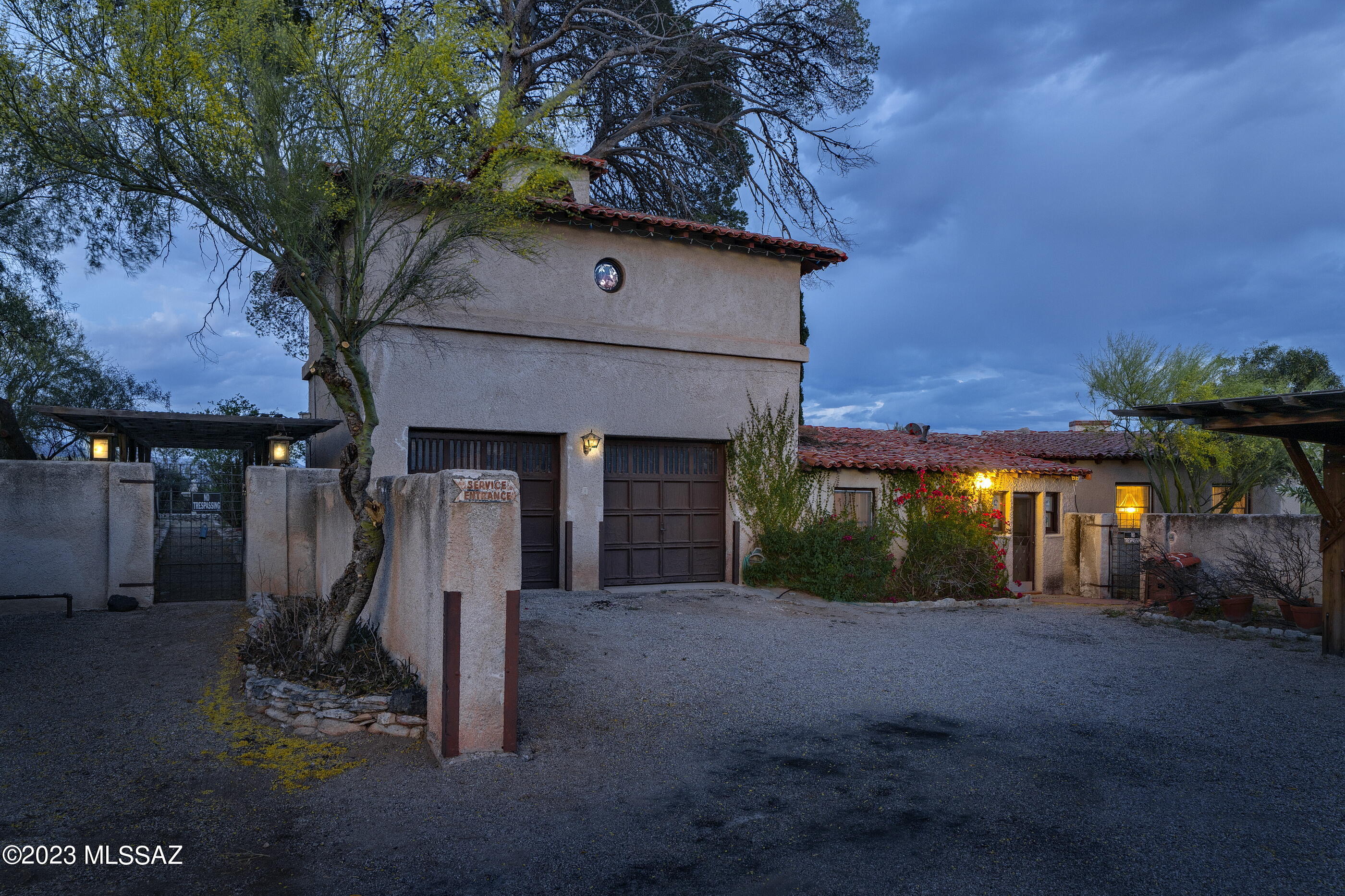 Own a piece of history! Early1930's Joesler in up on a private hill in Catalina Foothills Estates. Main house is 3 bed, 3 bath w office & attached sitting area, could be used a library or media room. Lovely wood floors in the dining & living room, tall windows, multiple patios & family room overlooking the back yard & mountains. 540 sq ft studio guest quarters over the 2 car garage w private entrance. and bath. Great period features include round door frames, beamed ceiling, large fireplace w hearth, unique lighting. 2 basements , one for storage, the other houses the HVAC systems & water heater. Home also has a 2 stall stable & small animal pen. Pool & spa need to be replastered. See floor plan in documents & photos to appreciate the flexible space. National Register of Historic Places.
