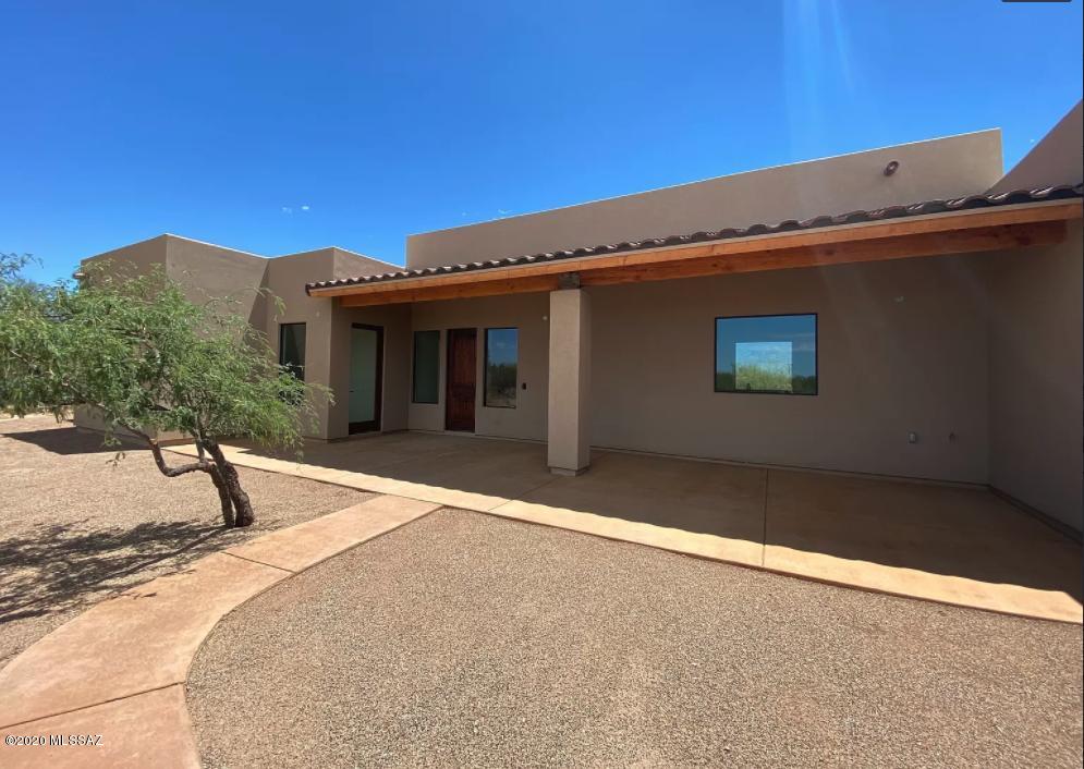 Seller will accept/counter offers between 785,000-808,000. Owner/Builder presents this Beautiful Custom Home on 2.5 acres with Spectacular Views of the Catalina and Tortolita Mountains. Split floor plan with Large Master Suite and Three(3) Bedrooms. 2x6 Wood Frame Construction, Synthetic Stucco Exterior & Built up Roof. Travertine Tile Floors, Carpet in the Great Room and Bedrooms. Knotty Adler Custom-made Cabinets with 3cm Granite Countertops. Knotty Alder Custom Stained Doors. Custom designed with High Coffered Ceilings, Plant Shelves and Niches. 6'' Can Lights with Skylights and Solatubes. Pre-Wired Security Alarm w/two keypads and Four Exterior Cameras. Pre-Wired Surround Sound System in Great Room. Pre-Wired for Wi-Fi Access Points. Central Vacuum System. Gas or Wood-Burning Fireplace in the Great Room, Electric Fireplace in Master Suite. Dual Pane Off-Set Glazing Aluminum Thermal Break Frame Windows for Noise Reduction. GE Stainless Steel Appliances includes Gas Cooktop, Range Hood, Oven, Microwave, Dishwasher and Garbage Disposal. Under Cabinet & Upper Accent Lighting in Kitchen. Master Suite & Bath: Electric Fireplace. Large Walk-in Closet. Corner Tub. The Home is equipped with 2 Air Handlers, 2 Water Heaters, Dual A/C and Gas Furnace Units. Oversized 3 car Garage with Automatic Garage Door Openers. Shared Water Well, Private Septic System. Entertain on the Spacious, Completely Covered Back Patio. Horse Property. No Horse Facilities on site. Stunning Custom Home for Families to Make Memories In. This Oro Valley property is close to Excellent Schools, Shopping and Dining. Amphitheater School District: Wilson K-8 Elementary School, Ironwood Ridge High School; Private Schools. Utility Companies: Tucson Electric Power, Southwest Gas, Satellite Ready.
