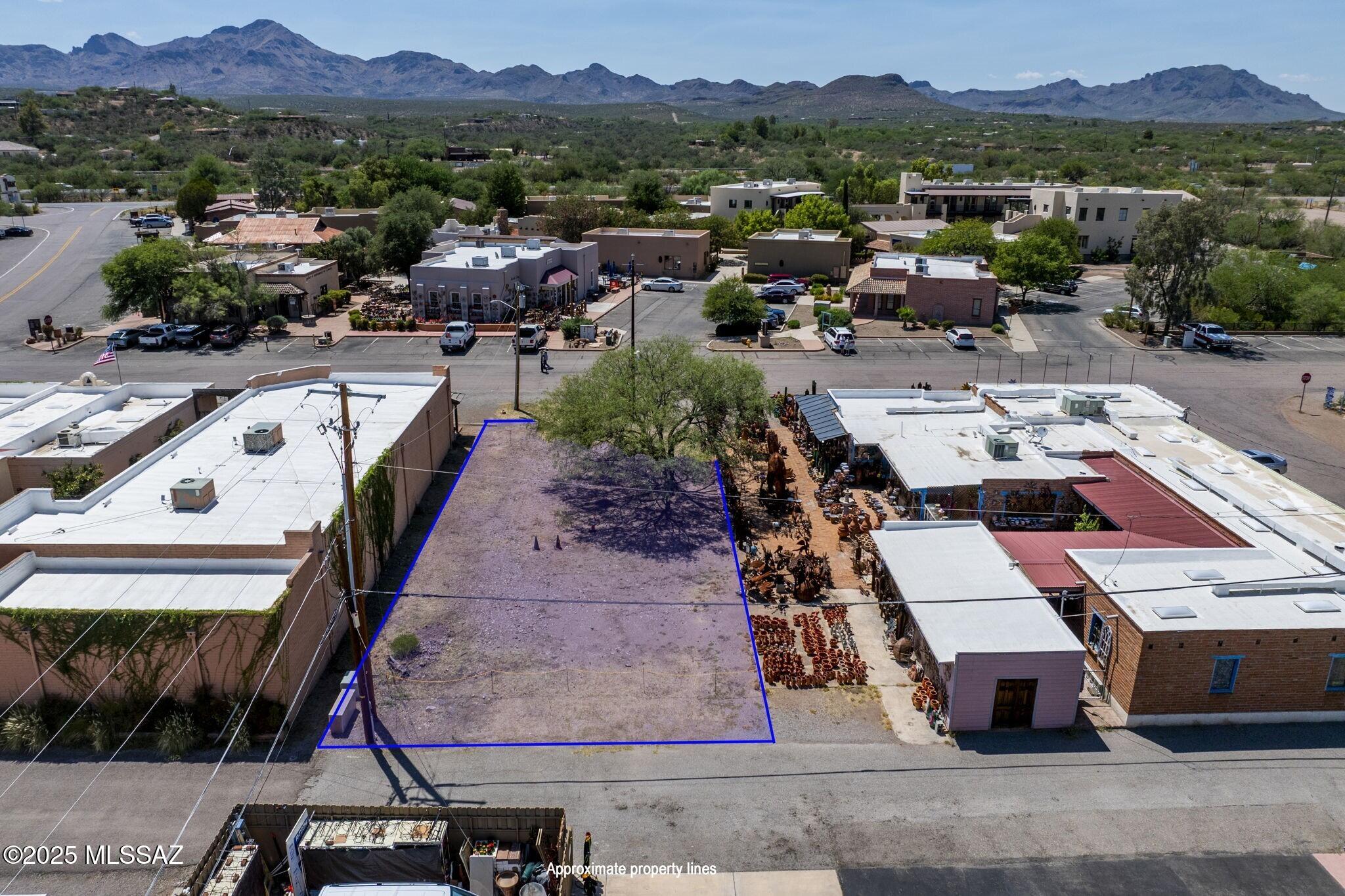 Rare Opportunity in the Historic Tubac Village! Build your dream business on this prime lot offering excellent visibility in the heart of Tubac's vibrant art and shopping district. This property is ideal for a retail shop, gallery, café, or other commercial venture. A 1,500-gallon septic tank and 500-gallon grease interceptor have been installed, saving you time and expense in development. Just steps from renowned galleries, restaurants, and cultural attractions, this lot is ready for you. With its convenient location near I-19 and ample potential for custom development, this parcel is perfect for investors or entrepreneurs looking to establish a presence in one of Southern Arizona's most charming and culturally rich destinations.