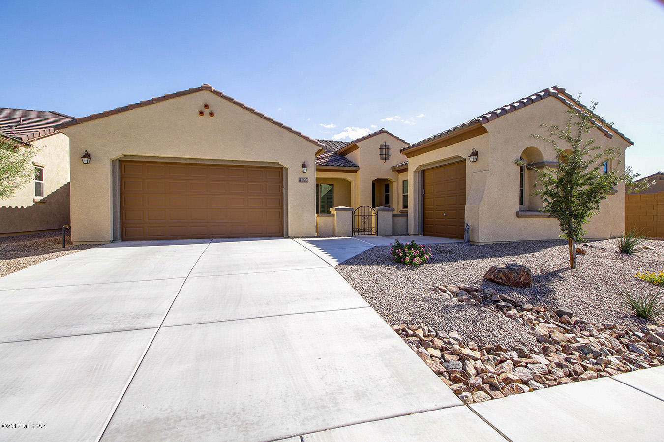 Beautiful Landscaped Backyard with Travertine patio flooring and an Extended Travertine stone patio area.  Backyard boost Trees and shrubs with Mountain Views.  Top Quality Screens installed that includes a remote control.  Walk in to a grand foyer with vaulted ceilings and custom design features through out this beautiful home.  Like New Pulte Home built in 2016. 3 Bedroom/3 Bath Plus Den.  Open Floor Plan w/Large Great Room, Lots of Windows to enjoy the outdoors.  Gourmet Kitchen features a large Granite Island, Walk-in Pantry, Double Ovens, 5 Burner Gas Range, Espresso Cabinets, Stone Tile Backsplash. 18'' Porcelain Floor Tile with upgraded carpet in bedrooms.  Master Bathroom has Extra Large floor to ceiling tiled shower w/ bench, Separate Granite vanities and large walk in closet.