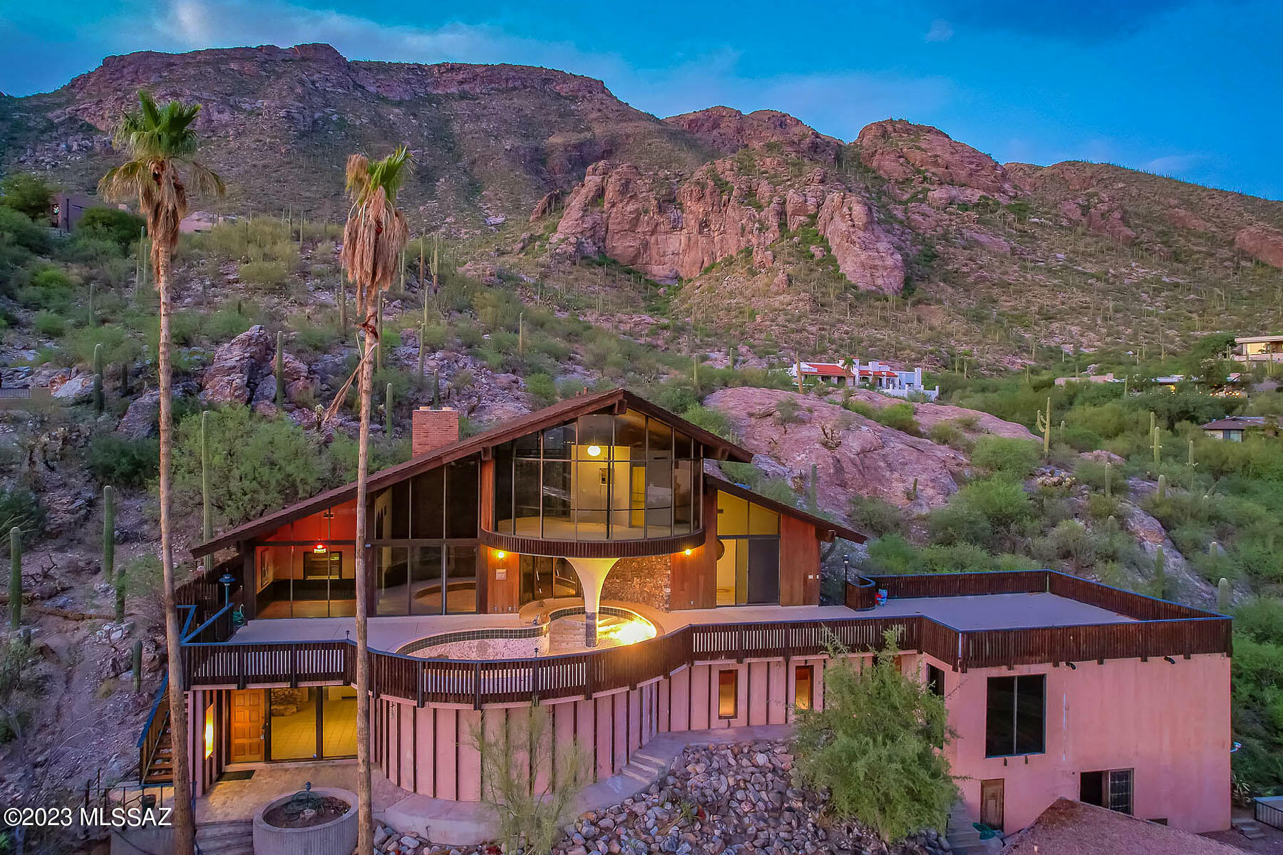 Back on Market. Rare opportunity for Mid-Century Modern fixer upper in coveted Skyline Country Club Estates. Unique multi-level home nestled on a private acre lot offering STUNNING views of the city, mountains, sunsets and rock formations. The 3BR/2.5BA with den main house has 3155 sqft living area with soaring ceilings, spacious deck with unfinished pool and amazing views. 1BR/1BA GH with 580 sqft. Separate 1150 sqft unfinished building. Updated HVAC units. Renovations needed but priced at only $214 a sqft and  does not include unfinished area. See agent only remarks for offer requirements.  Caution empty pool. 

See floor plan, estimates, HOA Benefits and Info sheet & HOA Addendum in attached documents 

Skyline CC Est has a golf course, tennis courts, fitness center, clubhouse. Please write in offer No SPDS. Subject property to be sold as-is. 

Unfinished structure is locked for safety reasons. Caution pool is empty. 

Buyer to pay one time Buyer's Reserve Fee of $1000-$1250 at COE. 

Please use Agave Title, Kelly Ladrido Escrow Officer. 520-918-1683. Kellyl@agavetitle.com. Prelim received.