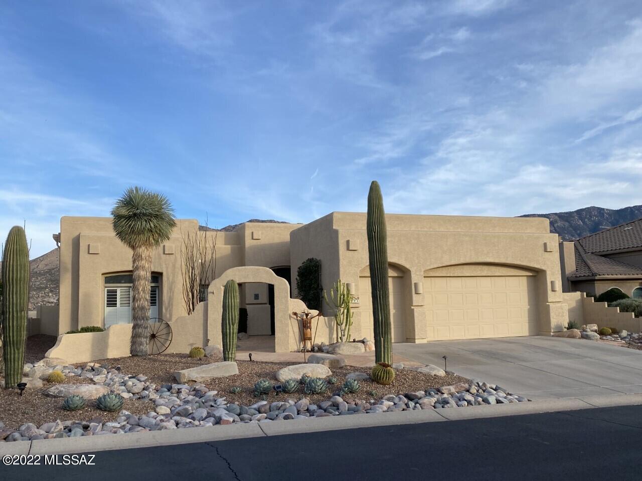 This gorgeous home may have started out as a MONTANA but you should see her now! Located on a terrific view lot w/panoramic mountain views & a lovely pool, this is a complete re-model, thoughtfully conceived & executed to a high standard throughout. Interior walls removed to create fabulous Great Room. Mountain views fill the large, east-facing picture windows. New porcelain tile floors everywhere. Both Bathrooms completely re-done. Kitchen, also re-configured & re-done, now completely open to the Great Rm & views; splendid center island & custom cabinets. 2.5 Garage. Santa Fe style. Back Patio Cover was considerably raised at build, enhancing views. Kiva fireplace in Great Room. Just a completely fabulous home, located in SaddleBrooke's HOA One, Unit 21.