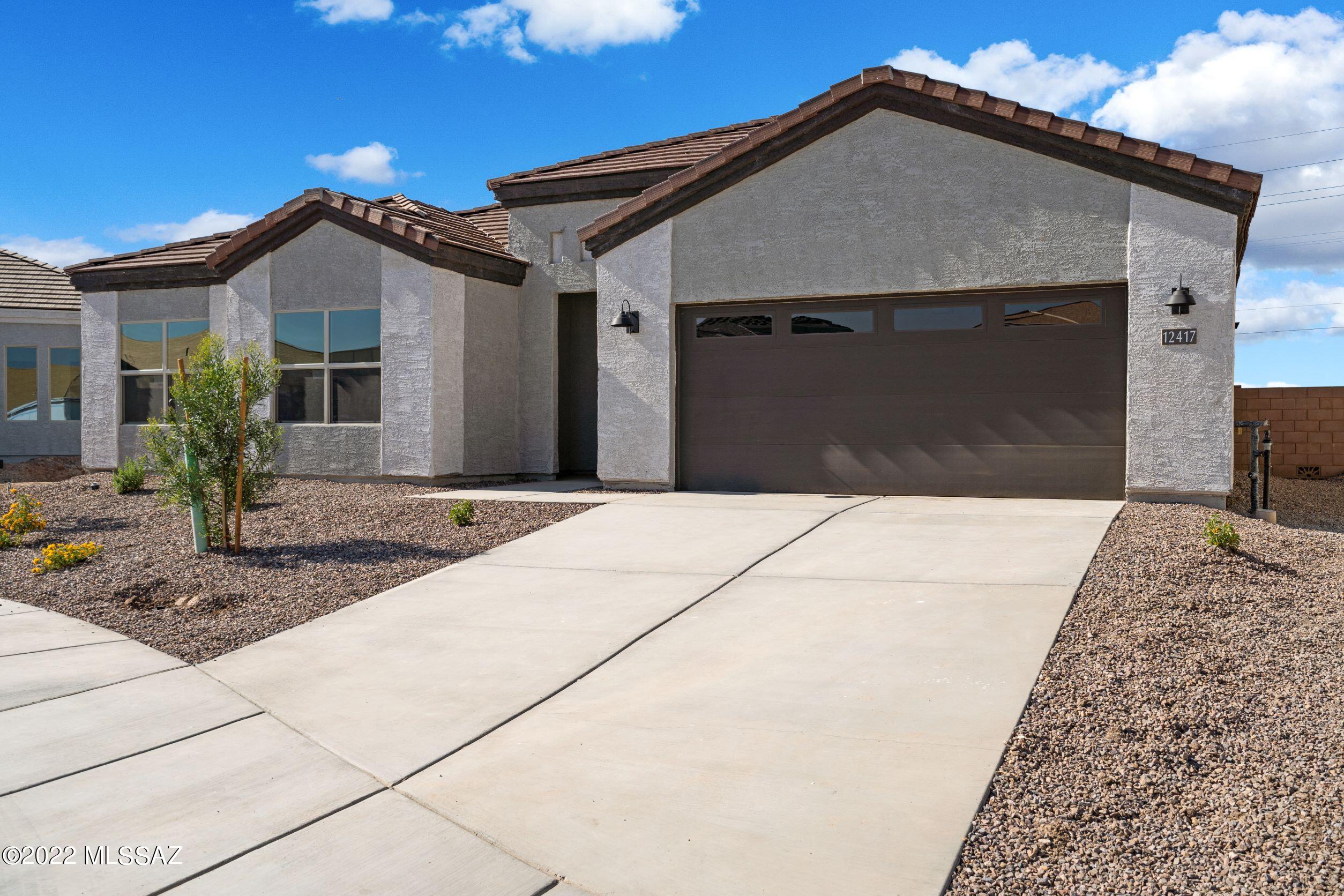 BRAND NEW HOME! This home is perfect for your big family. Located in Marana's Barnett Village, this beautiful home has 2,626 sq. ft. of living space with 5 bedrooms, 3 bathrooms, and a 2 car garage! With a spacious lot and modern finishes included, this home also features ceramic wood plank tile throughout the home with carpet in the bedrooms, quartz kitchen and bathroom countertops, beautiful kitchen cabinets, thick base boards, and much more!
Home has never been lived in.