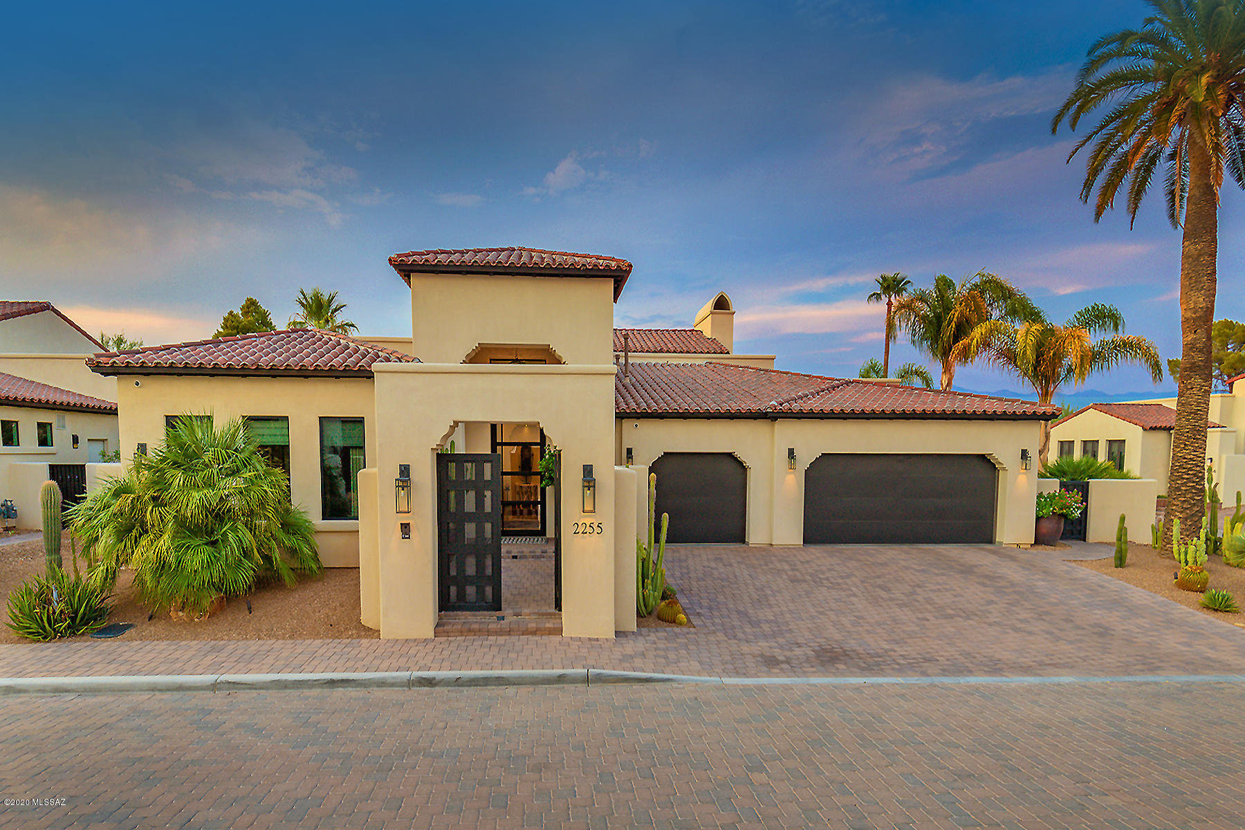 This move-in ready like-new custom home was featured in Tucson Lifestyles, September 2019. Enter home through inviting courtyard leading to 10-foot pivot door to a well configured floor plan which embodies a light & bright interior w/ high ceilings & exposed beams, seamless indoor-outdoor flow, & spacious living areas. Entertain in chef's kitchen w/ Quartzite counters, GE Monogram appliances, & full butler's pantry. High on style w/ luxury amenities including honed limestone flooring throughout, 8' solid alder doors, polished marble counters in master bath, family room bar, remote operated custom blinds, & more! Master suite features FP w/ Serranto precast mantel, dual closets, spacious walk-in shower, & direct access to laundry room. Casa Seton developer's personal residence.