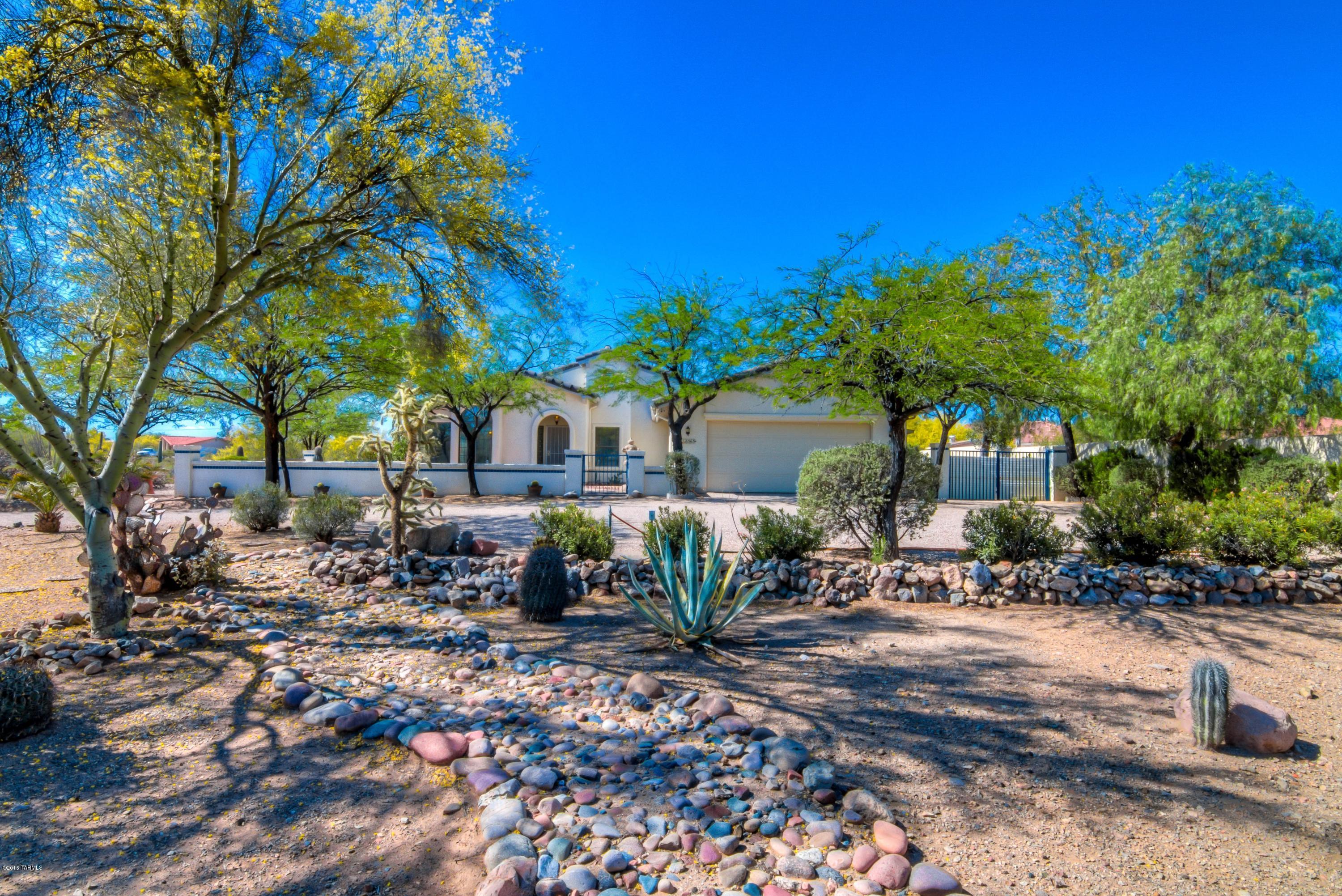 Continental Estates Retreat on Spacious 1.6 Acre Lot! Home features separate Living & Family rooms, formal Dining, soaring ceilings, lots of natural light, amazing desert views from inside, newer HVAC system & water heater, poly plumbing has been replaced with Aquapex & copper, side yard with plenty of room for your toys, bonus storage shed and much more. Kitchen offers rich wood cabinets, coordinated appliances & bay window Breakfast area. Finished spacious Arizona Room offers many possibilities for living & entertaining. Master Suite has huge walk-in closet, dual sink vanity & relaxing tub. Fully landscaped backyard with refreshing PebbleTec pool, rock waterfall, covered Pergola patio & spacious deck area. Flat acreage behind the home for Guest House or other options for your future use!