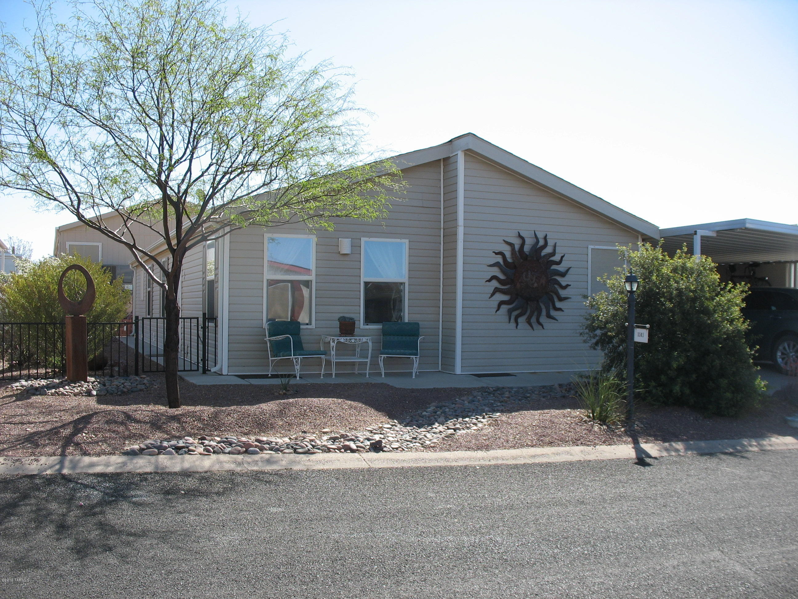 Copper Crest is a 55+ gated, very beautiful, serene community.  Surrounded by stunning views, open desert, and a wonderful community atmosphere.  This home has been completely customized to the finest detail; fabulous chef's kitchen, custom alder cabinets,featuring an amazing amount of storage, REAL butcher block & laminate counter tops, with breakfast bar seating, walk in pantry with room for a second fridge or freezer, split bedrooms plus a den/craft room/office. Formal dining room will accommodate all of your dinner guests, spacious great room is perfect for entertaining or just enjoying relaxing evenings. THIS IS A VERY SPECIAL HOME READY FOR THE DISCRIMINATING BUYER WHO IS LOOKING FOR THAT PERFECT PLACE.  New Roof completed first week in June.