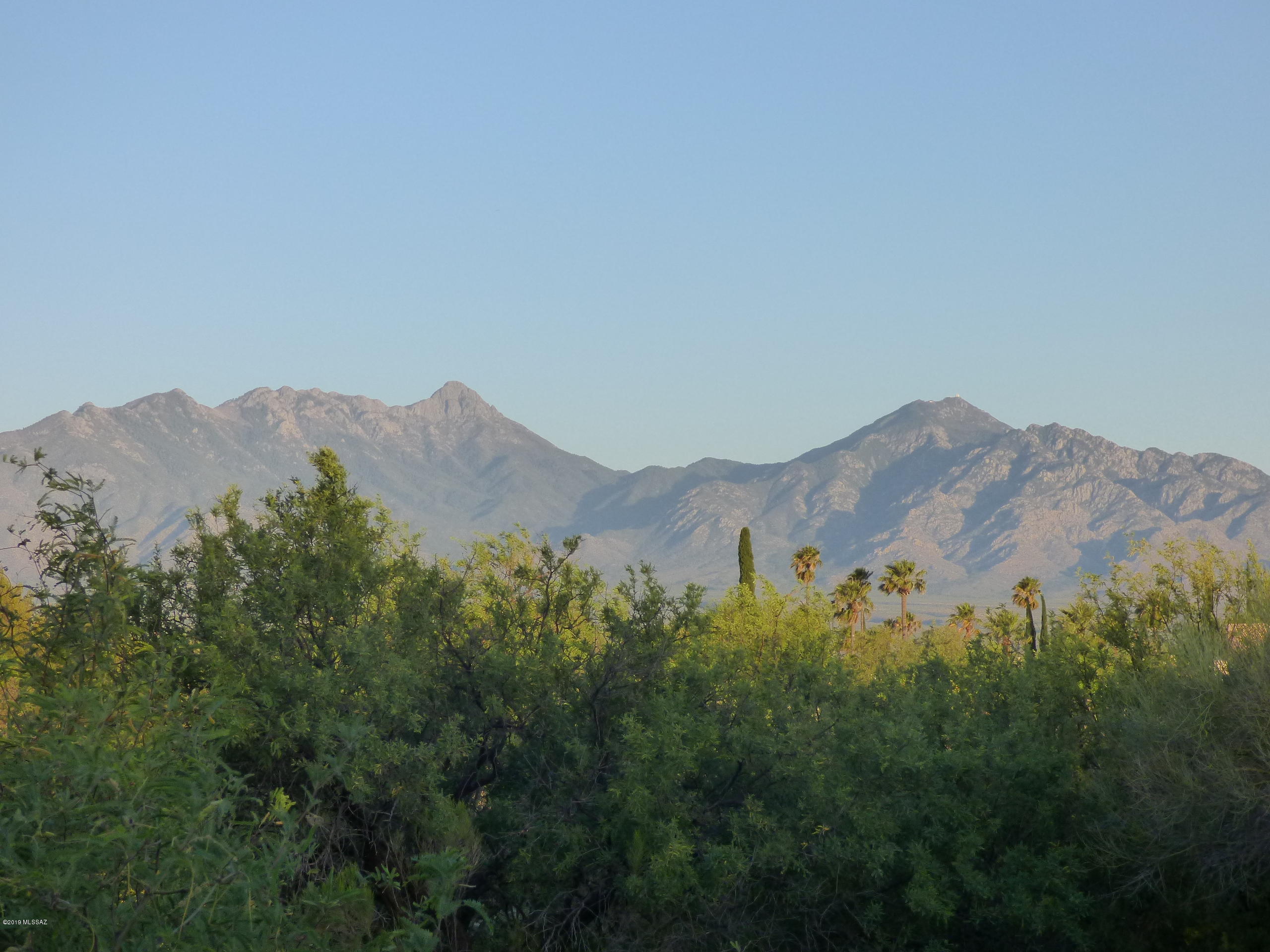 Views, Beautiful Las Campanas Home, A Very Bight and Open Floor Plan, 2 Bedrooms, Office/Den Area off of the Master Bedroom, 2 Living Area and a Formal Dining Area. Tile Floors, Corian Kitchen Counter Tops, 2 Side Fireplace and many more great features. MUST SEE !!!