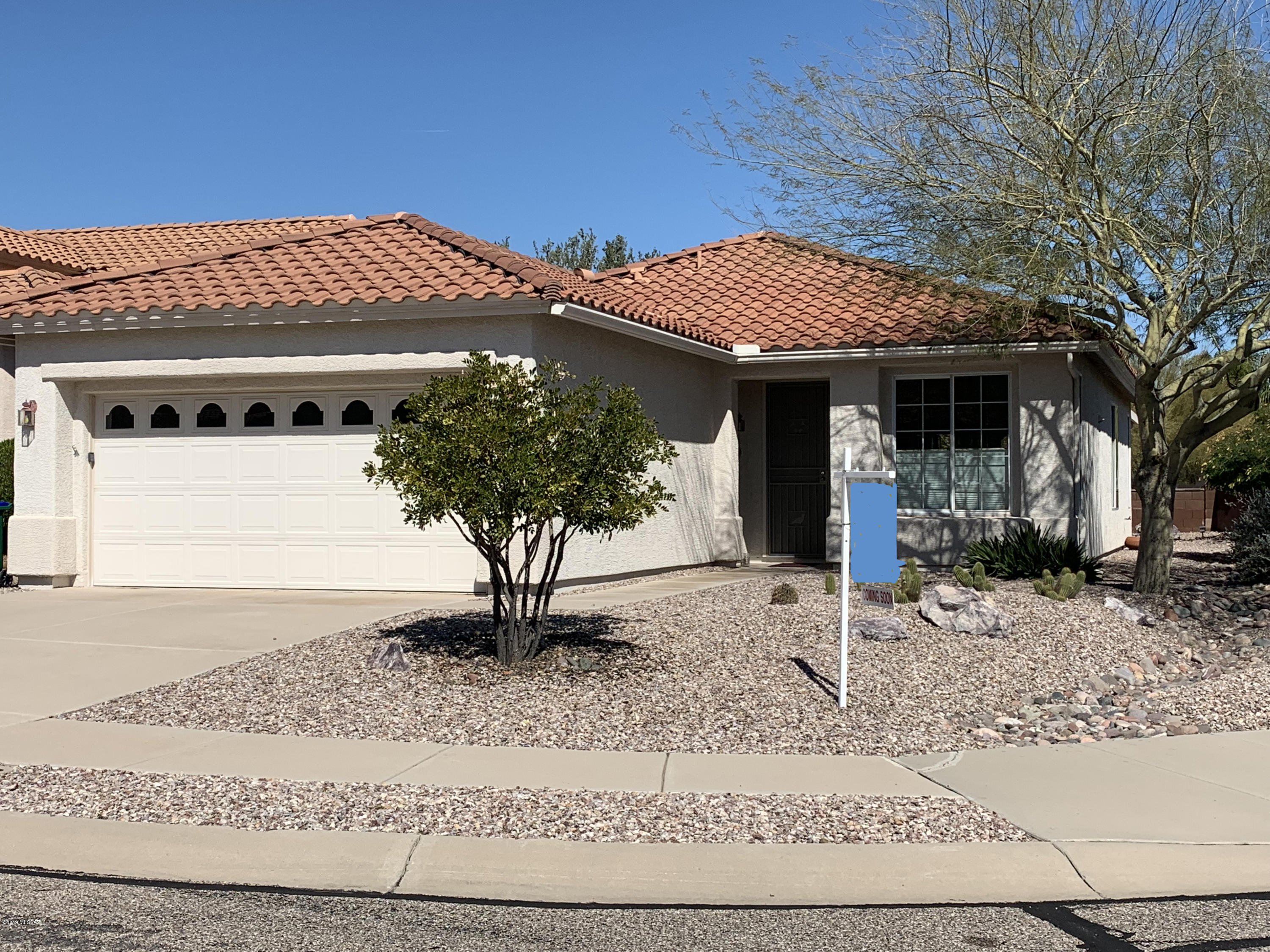 Views, views and more views will be yours in this Sierra model with spacious, extended garage.  Light and bright throughout, enjoy your morning coffee with a view of Sombrero Peak. Cozy kitchen has Maple cabinets, a breakfast bar & newer dishwasher & refrigerator. The large Great Room also has an area for a formal Dining Room. The Master Bdrm Suite with full bath and walk-in closet is roomy and accommodating. Convenient Guest Bdrm & Guest Bath. Covered back porch lets you enjoy the distant view of the Catalinas. Laundry Room has built-in cabinets (also hookups in garage), New HVAC in June 2018, Water Softener, pre-wired for ceiling fans, laundry tub & 50 AMP circuit in garage. This is a must-see home in the accommodating 55+ Community of Sunflower.