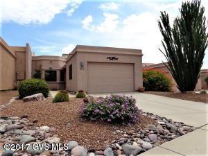 Less than a block away from a GVR Rec Center, this charming former model townhouse 1246 sq.ft., 2bed/2bath & wide 1-car garage. Featuring: A beautifully landscaped east back yard & mountain views which can be enjoyed from the patio & paved seating areas. Vault ceilings in Kitchen & Living enhanced by windows to the great back yard. Bumped out windows in master bedroom create space & comfort plus the bathroom vanity is across from a large walk-in closet. A pocket door to the bathroom lends privacy & comfort for the SafeLife walk-in tub, plus a convenient laundry room is next door. House EasyWater Conditioning System, plus Kitchen reverse osmosis water & a new range installed last year. A Ramada shades the front door & garage entry, plus the built-in garage cabinets still leave elbow room.