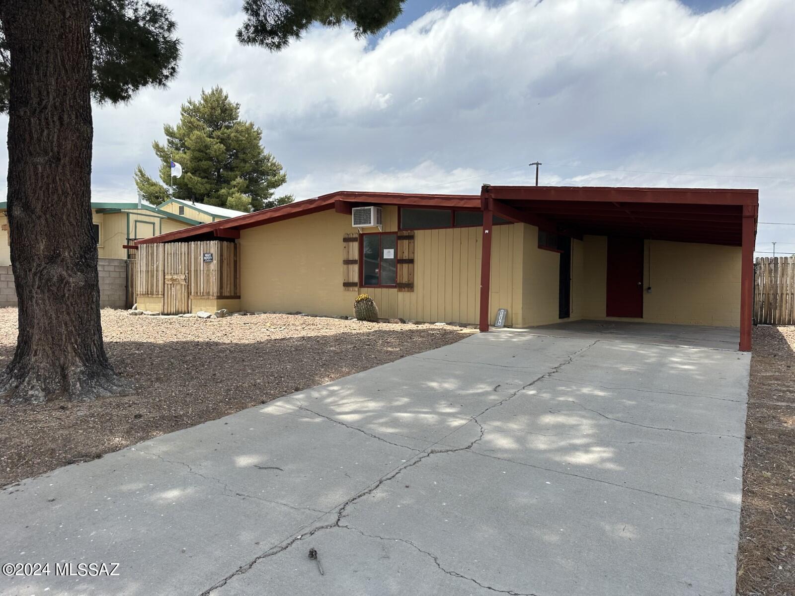 3-bedroom 1 bathroom site-built home.  Fully fenced back yard. 1 car attached carport. Detached building could be a 1 car garage, workshop or storage. Laundry hook ups on back patio. Property was built prior to 1978, lead based paint potentially exists.