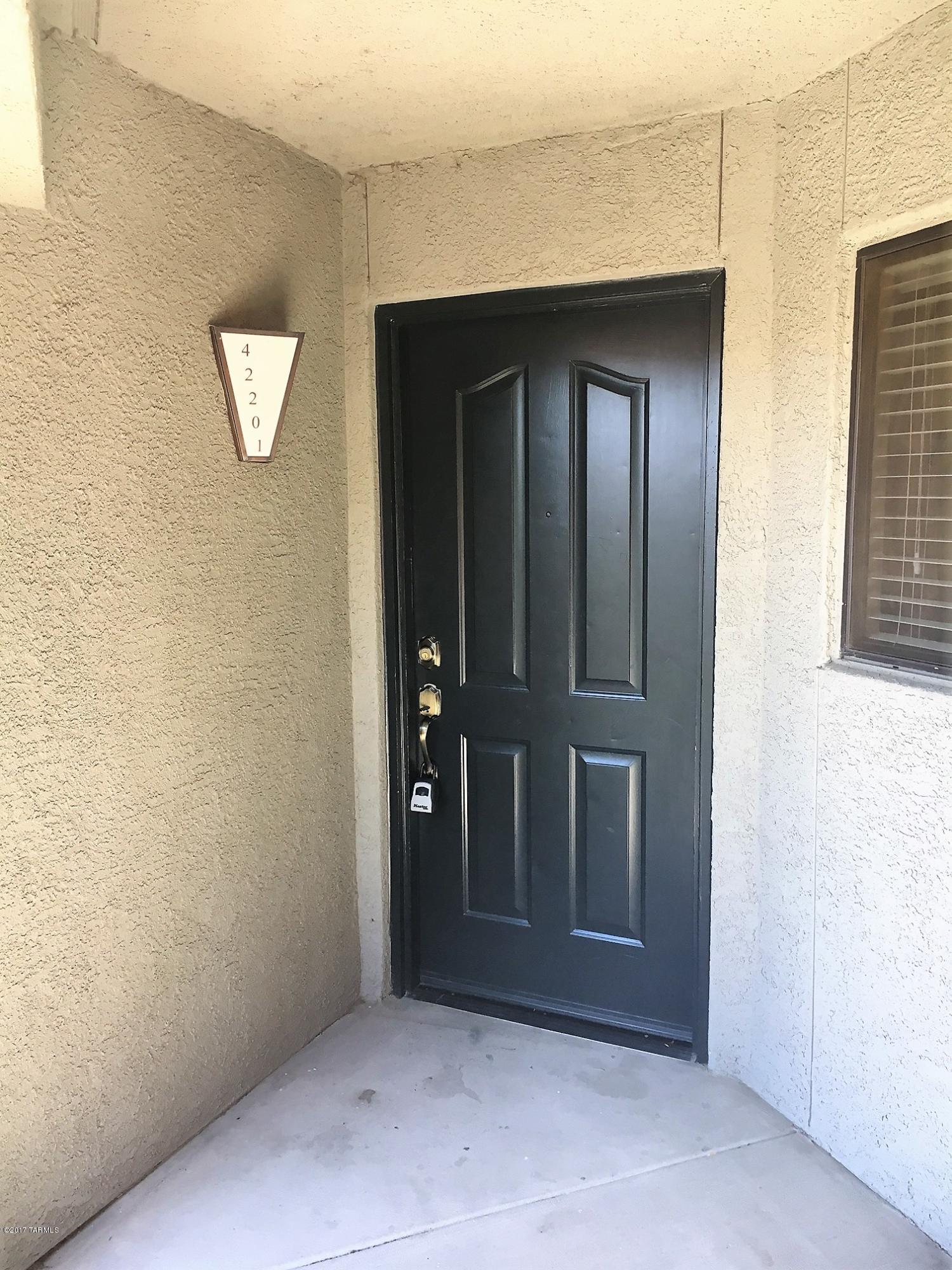 Coveted second floor location in gated Veranda at Ventana. This 2 bedroom 2 bath condominium features a split floor plan with walk in closets in both bedrooms, Linen closets on both sides of the home, updated cabinets and counter tops in the kitchen, tile in all traffic areas, black on black kitchen appliances, full size washer and dryer in the laundry room with cabinets above for storage. Veranda at Ventana features 24 hour gated access, 2 resort style pools, 24 hour fitness center and a clubhouse. In walking distance to several restaurants, a salon, grocery store +++! Great location next to a common area, close to the second pool, and one of many ramadas with natural gas BBQ's.