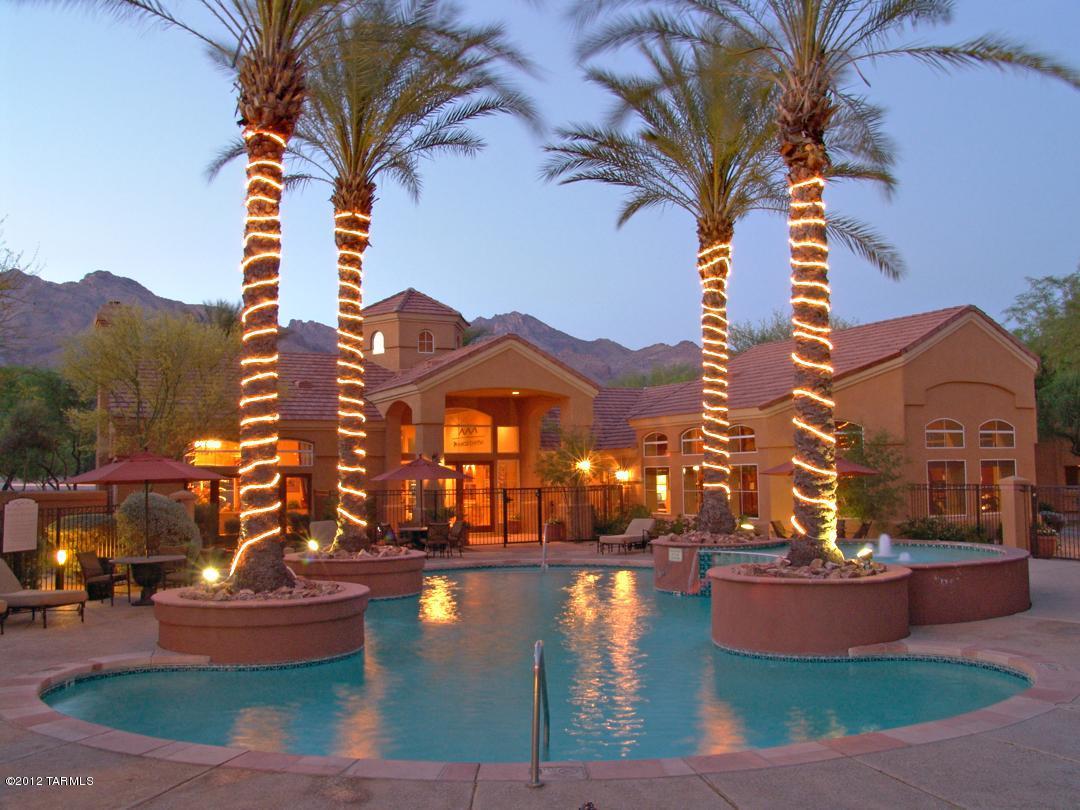 This upgraded 1BD/1BA condo with stainless steal appliances and granite countertops is located in the Foothills near Sabino Canyon. Pinnacle Canyon Condos offers Resort style living at its finest! Relax poolside and enjoy the sounds of the cascading waterfall or in the evenings unwind next to the community fireplace. For those looking to be more active take advantage of the beautiful fitness center or hike, run or bike in nearby Sabino Canyon. Conveniently located near golf, excellent restaurants, grocery store, shops and more.