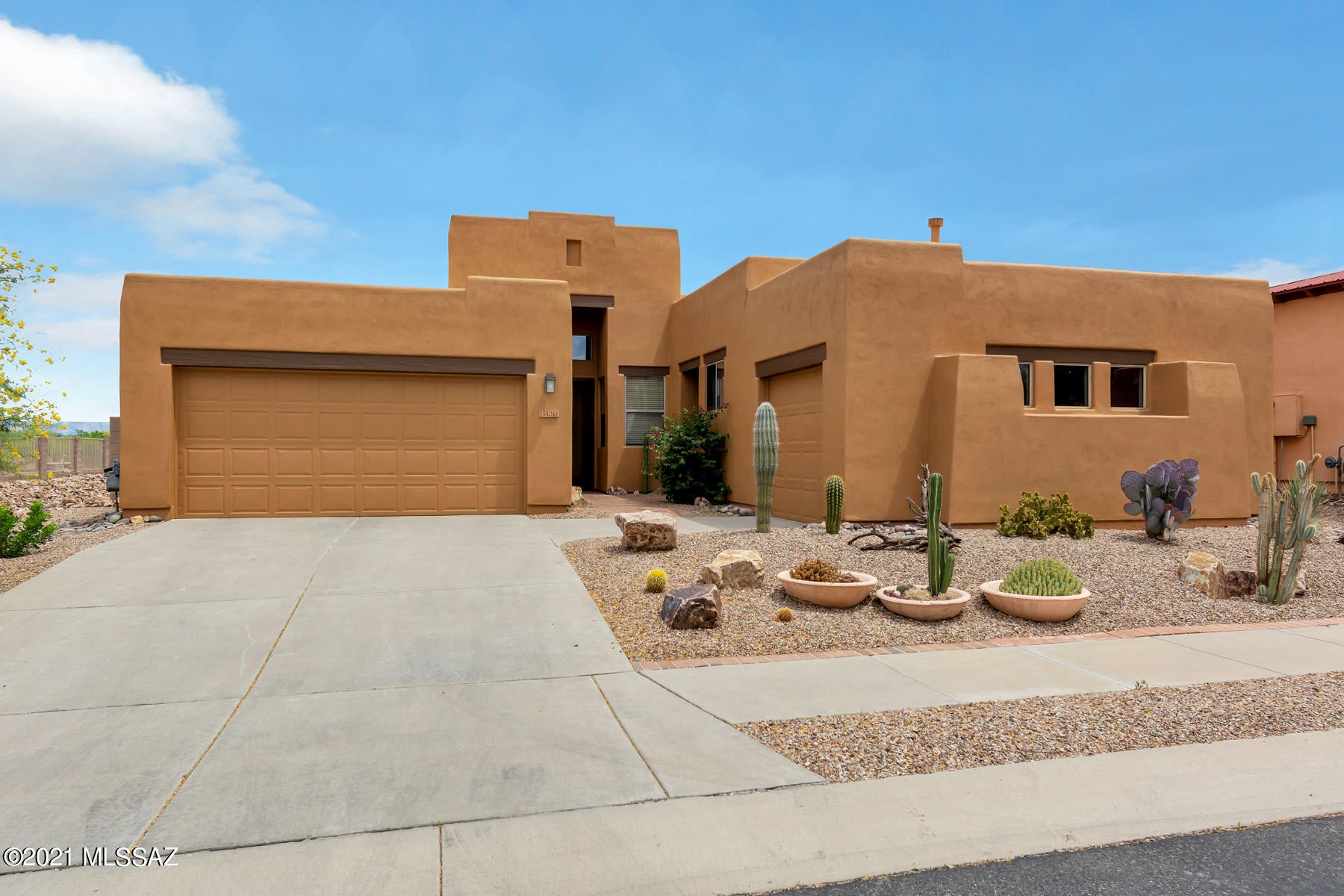 Spectacular 4 bedroom/2bath home located in Vail's premier gated community. As you enter you will be greeted with views of the Catalinas and the second hole of the Rancho del Lago golf course. Gourmet kitchen has plenty of cabinet space, granite counters and a pantry. Custom Corian sinks, tubs and shower in the bathrooms. The back patio is equipped with a wood burning beehive fireplace and desert landscaping complete with areas for relaxing. There are 2 finished garages to park your vehicles. Walking distance to the pool and spa.  Requirements:*Must make 3X amount of rent as gross monthly income.*Credit score of 600 or above.*No evictions.*Background must not include any felonies for past 10 years.*Other restrictions apply, call for details. Fees:$55 Application Fee per adult. Everyone 18 years or older is required to apply.$300 Administrative Fee. Accidental Damage Coverage $29 per month. Refundable Security Deposit equal to the amount of one month's rent.$300 Refundable Pet Deposit for each pet. Pet restrictions apply